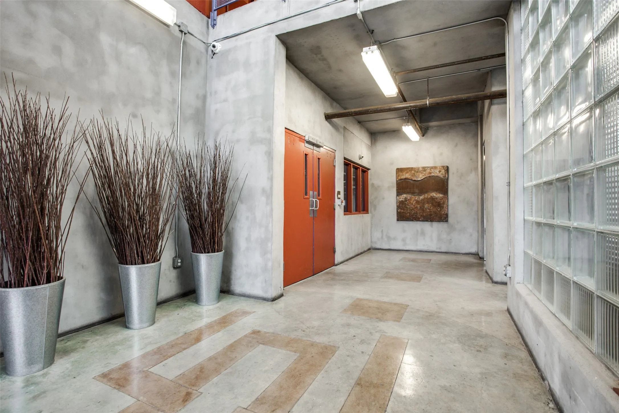 Hallway with elevator to #208