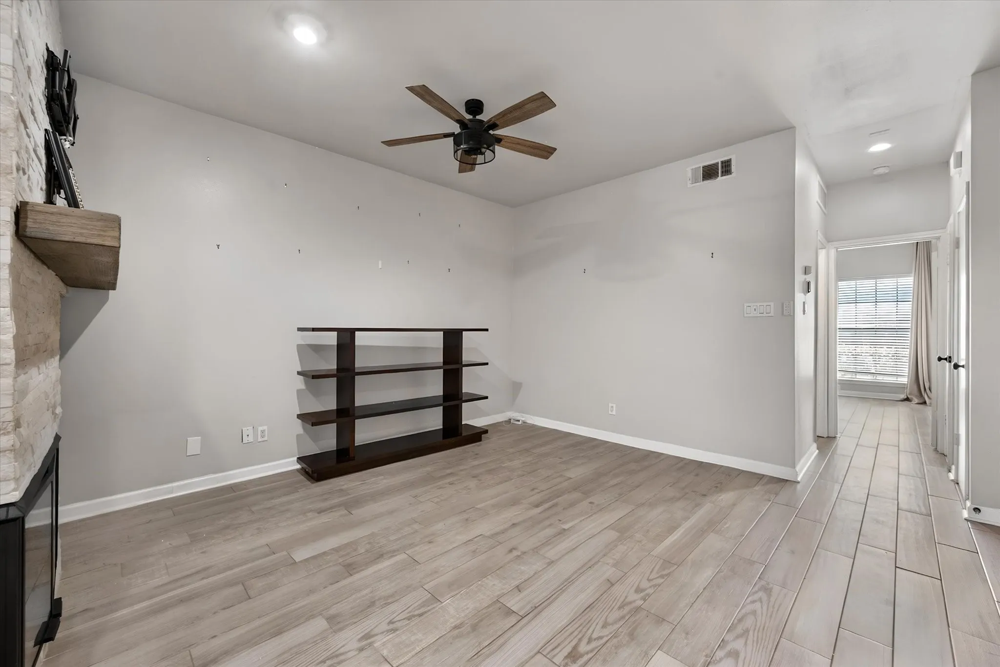Living room leading into the bedroom area