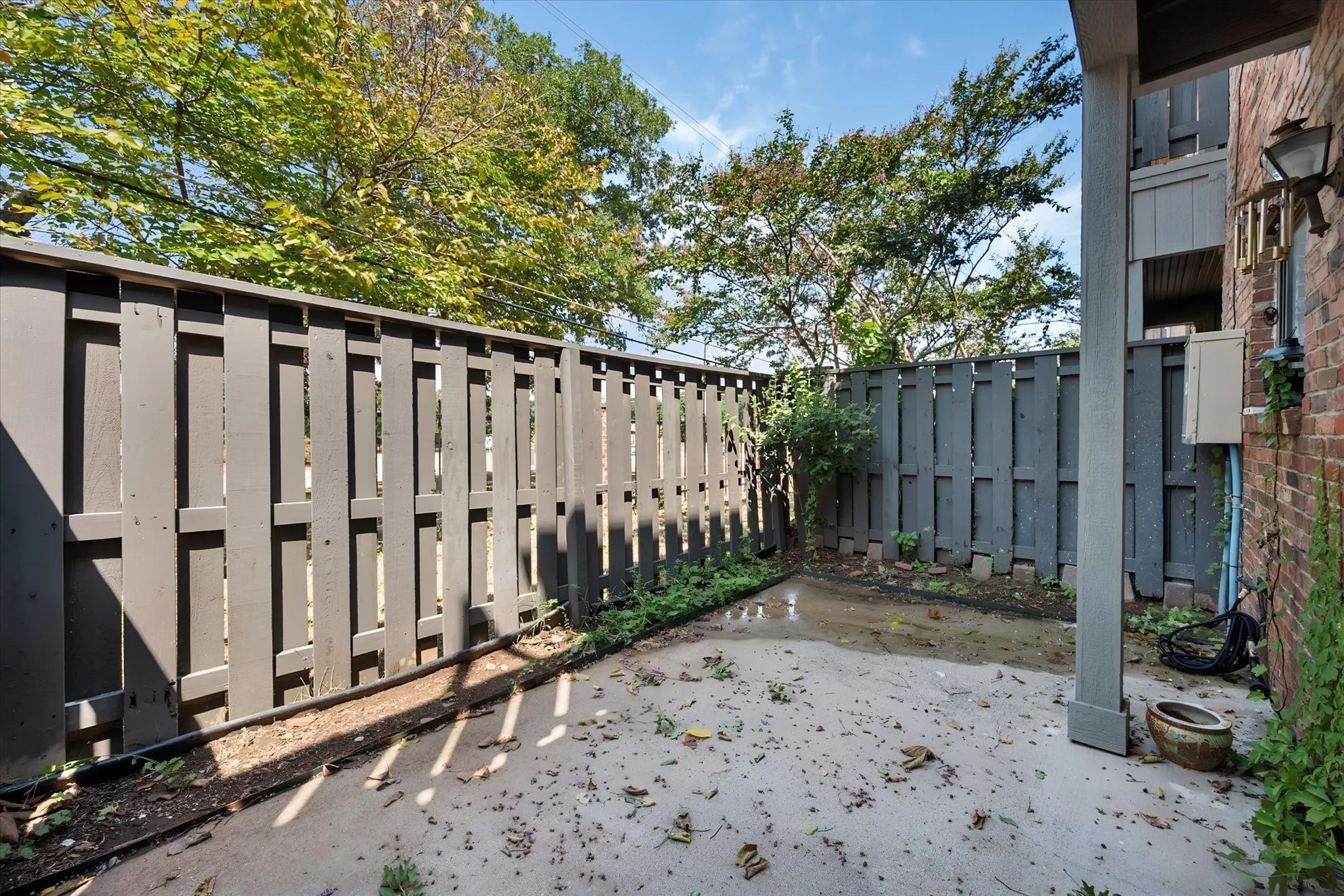 Fenced in back porch