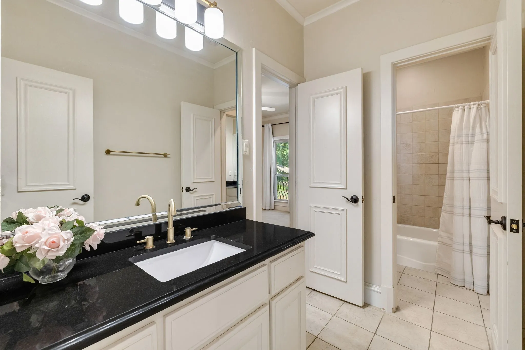 Secondary upstairs full bath.