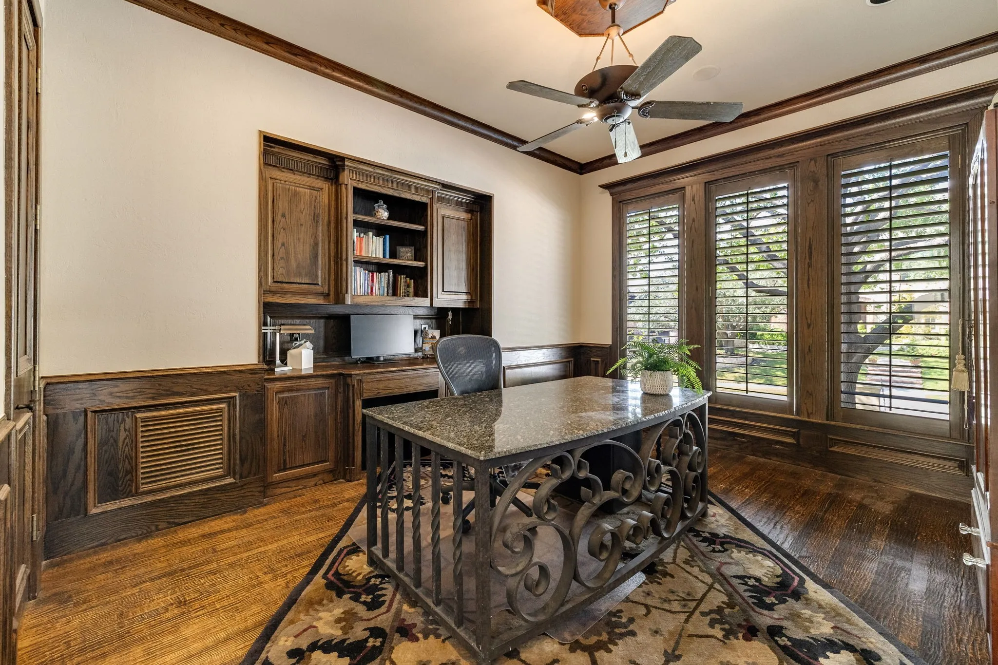 Dedicated private office with French door entry and built-ins.