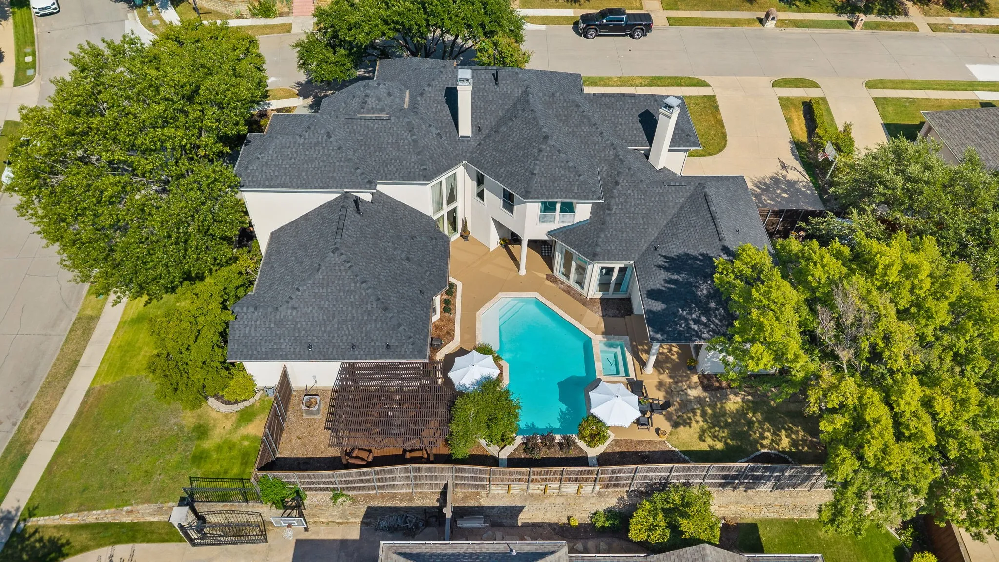 Aerial view of home showcasing backyard.