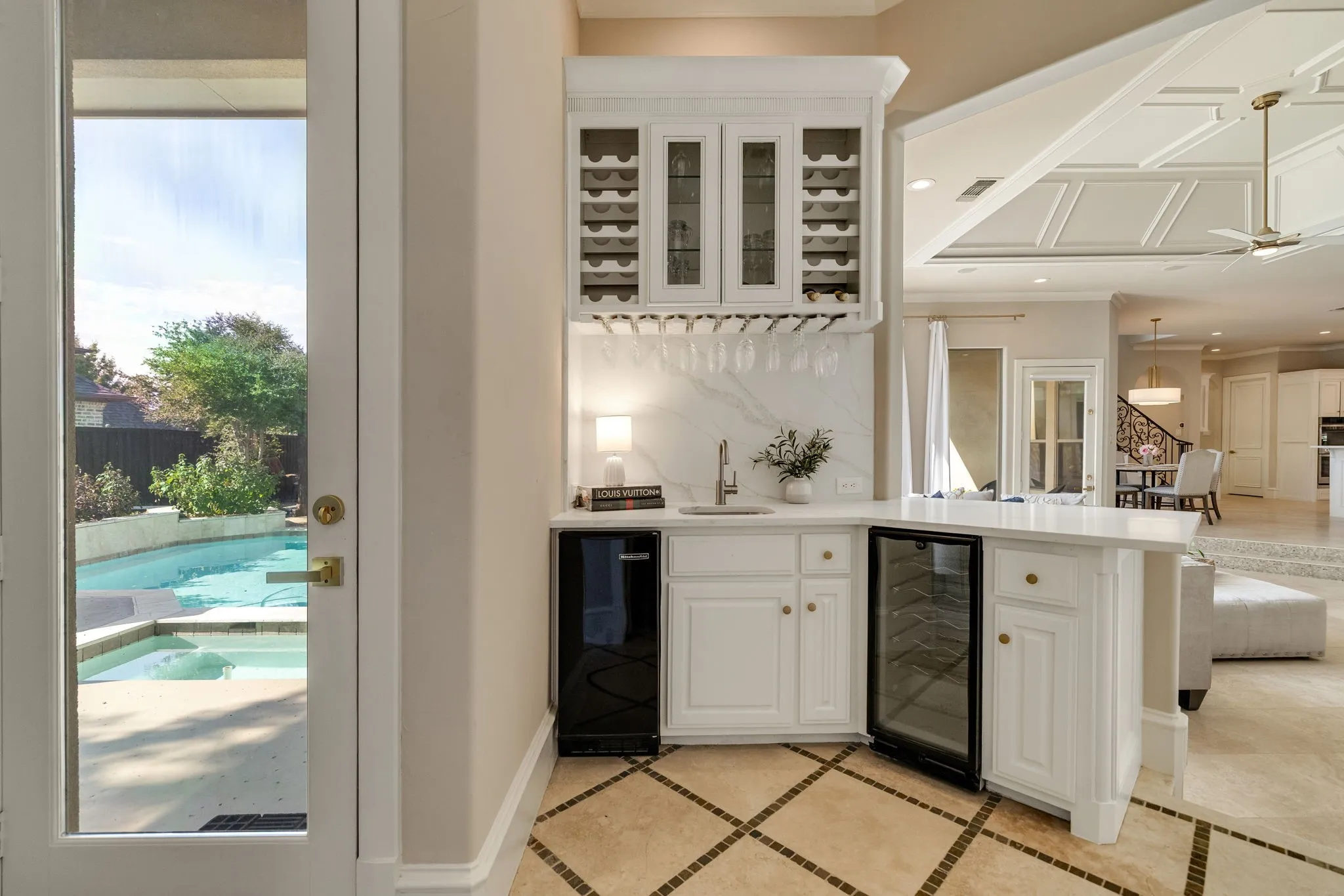 Wet bar area off living room with wine storage.