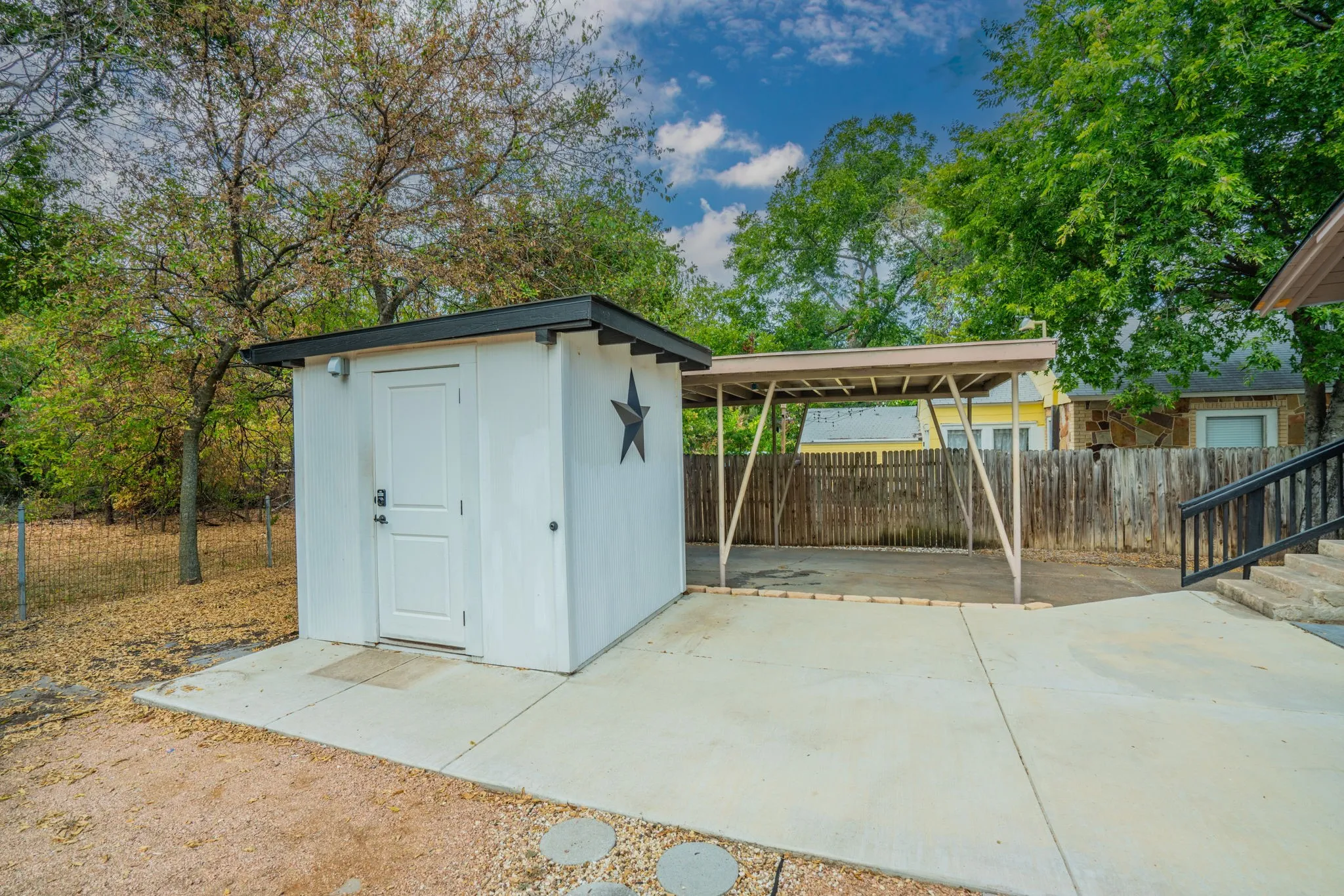 great new storage building with elec and pad for hot tub