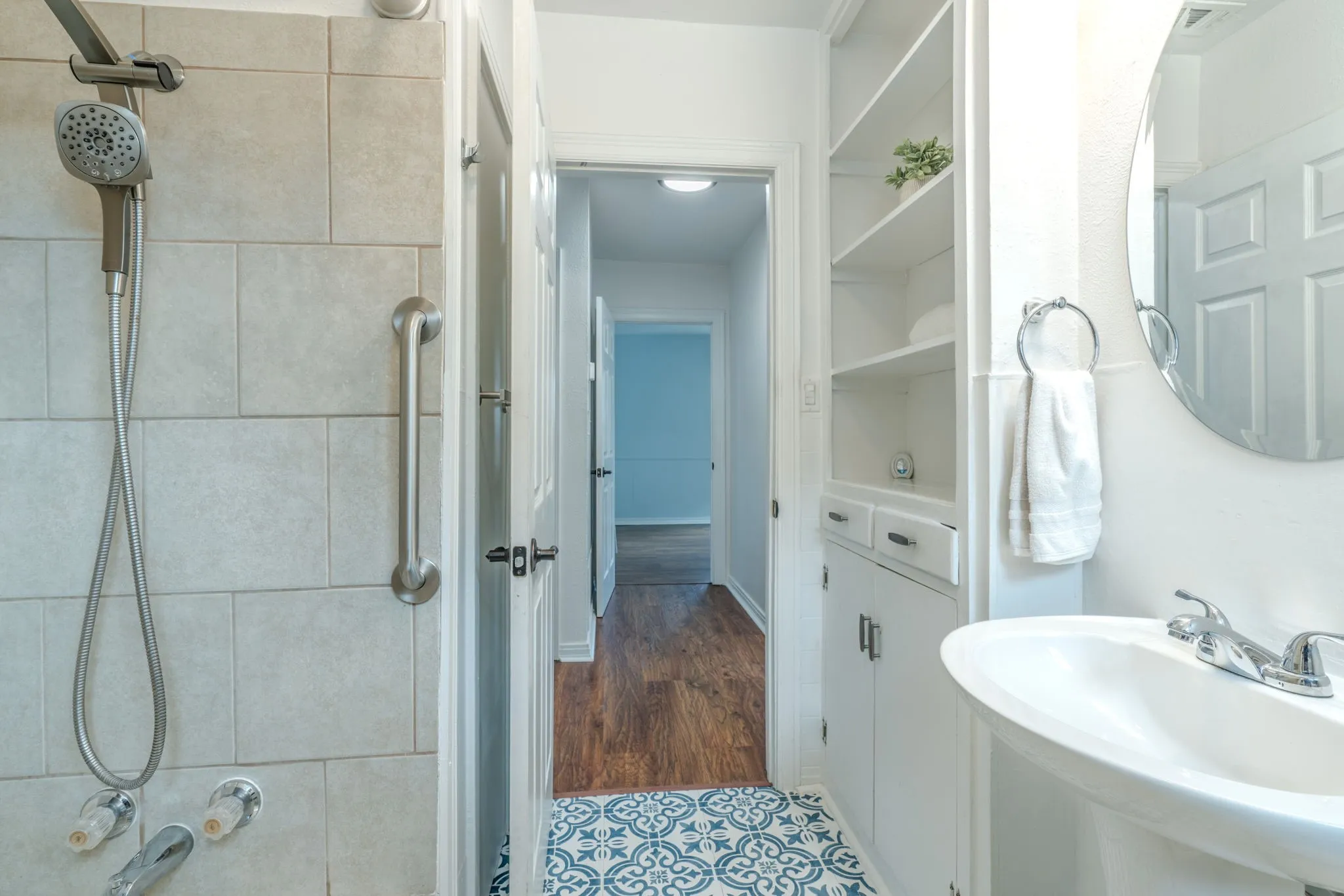 Main bath with newer tile shower