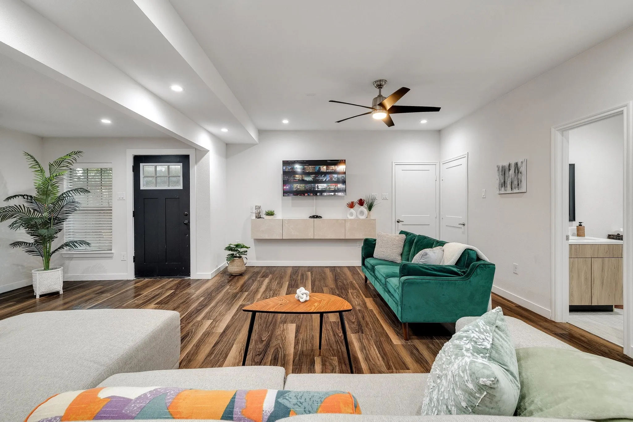 Wood-finish flooring throughout the living space