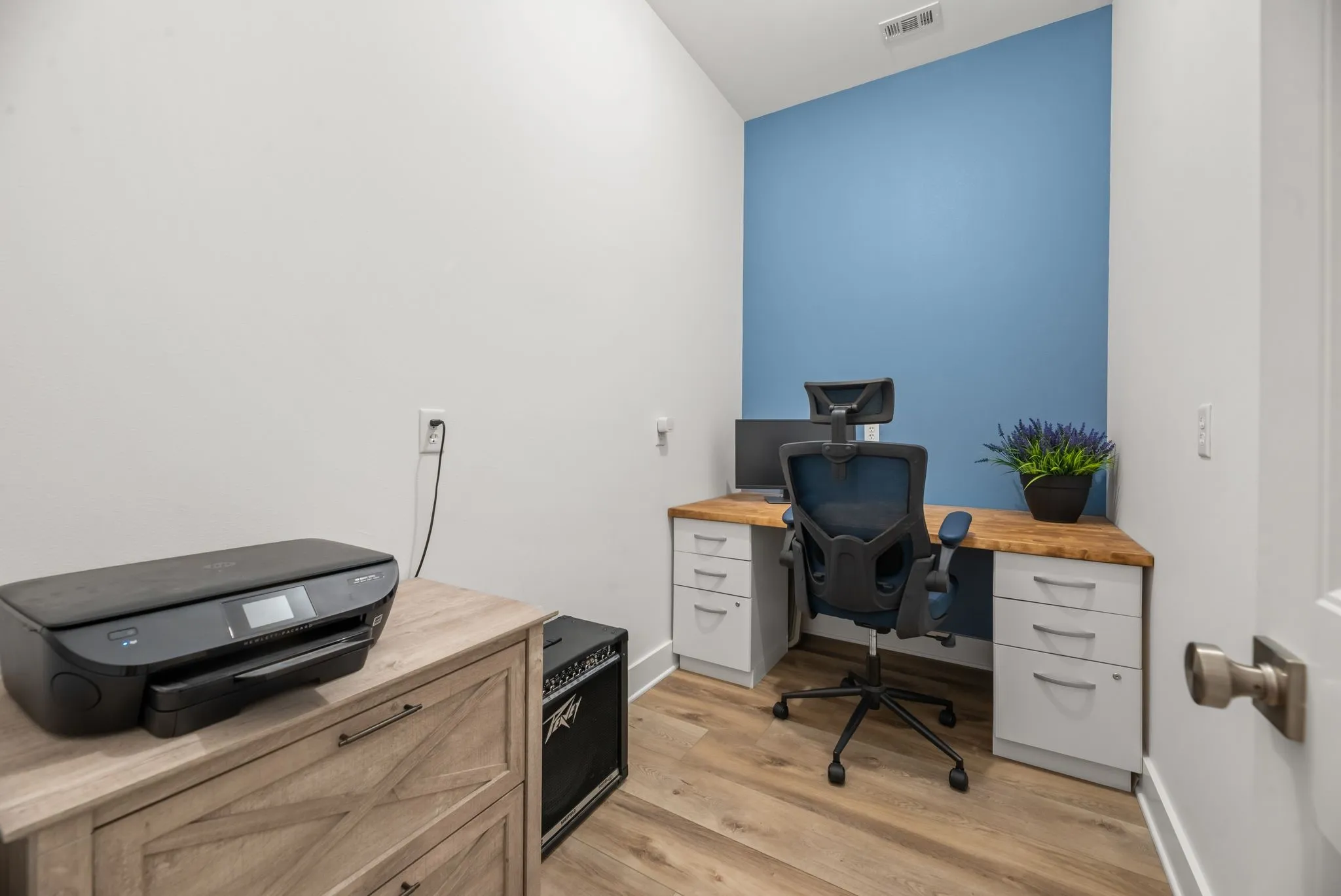 Dedicated home office provides a quiet workspace in this spacious Corsicana waterfront home.
