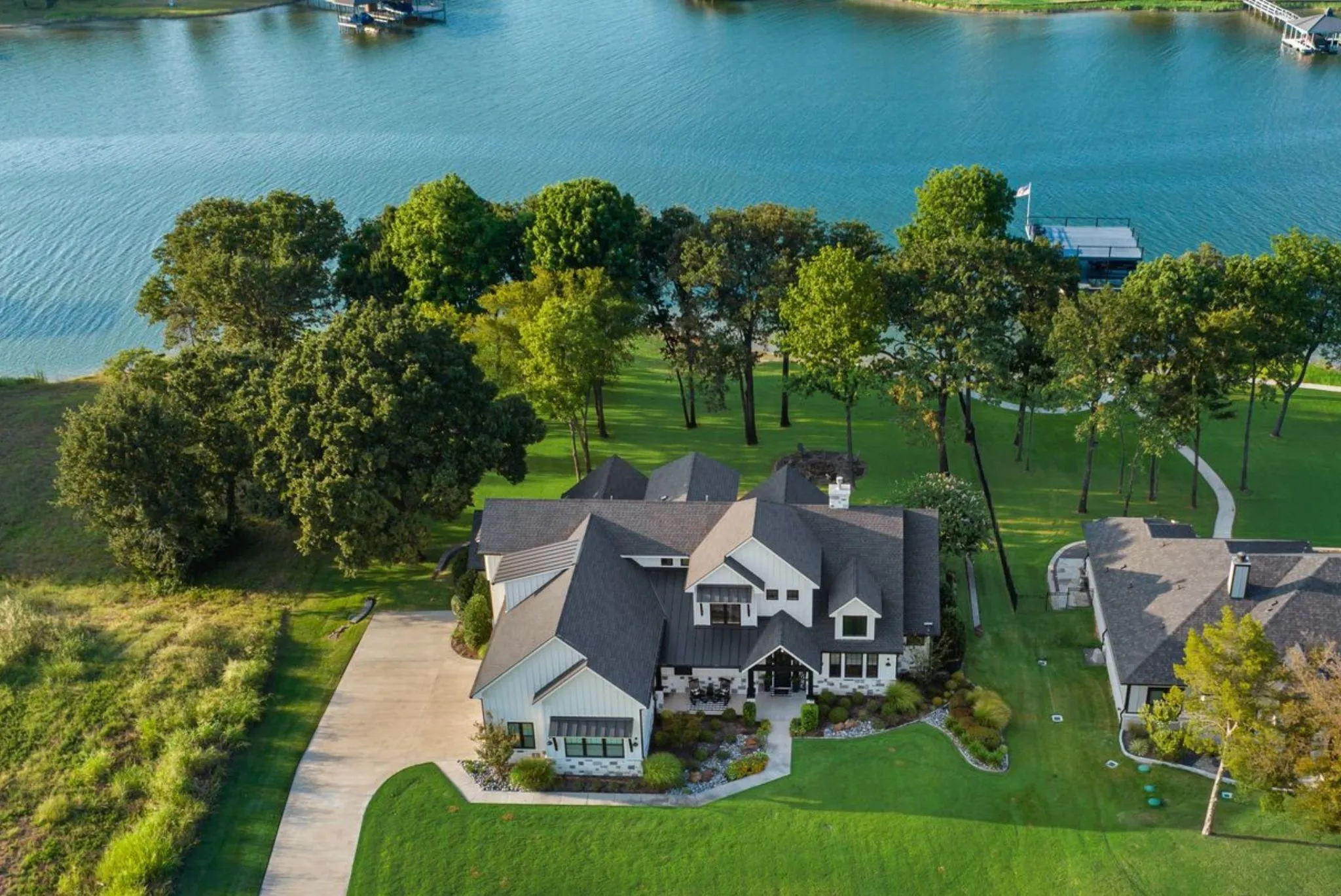 Aerial view of waterfront lake home.