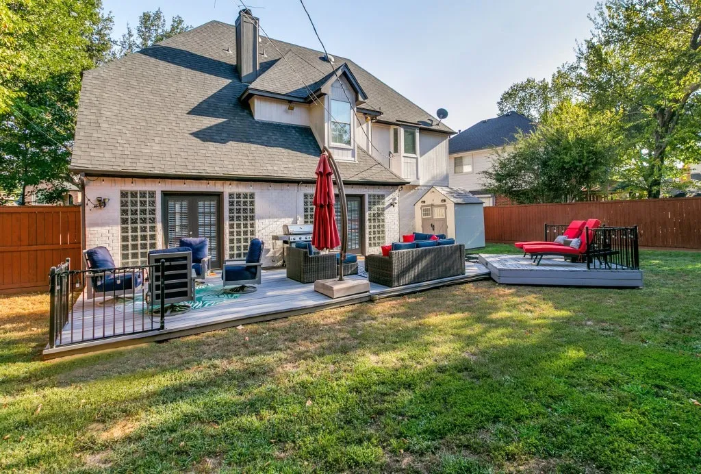 Back yard - backs to Stovall Park with walking trail, tennis and basketball courts, playground