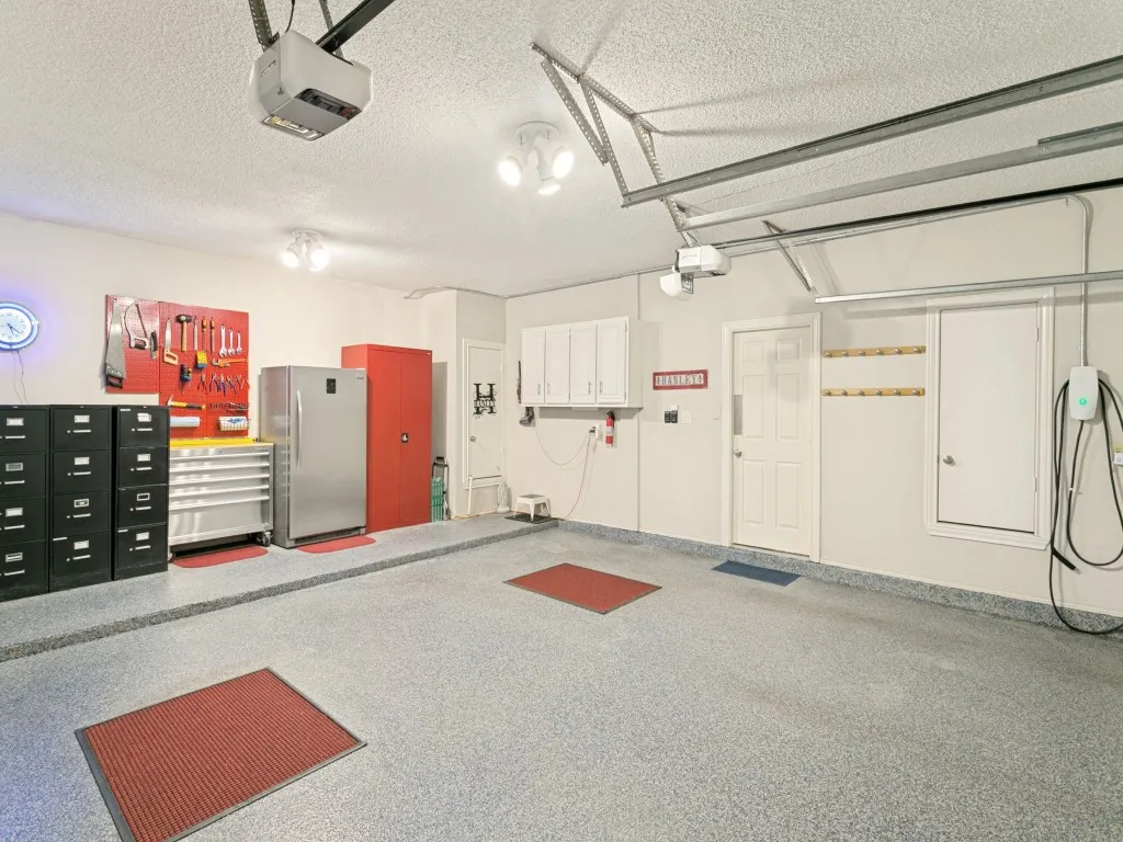 Garage area - with pebble tech coating, cleanest garage you'll find anywhere!!