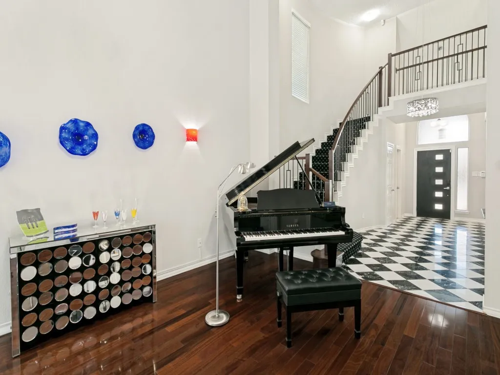 Living 2 - other view, with beautiful custom wood bannister, railing!
