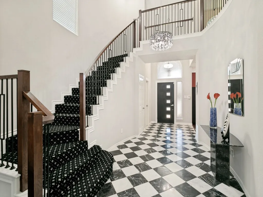 stairway - with stunning custom curved wood banister and railing!!