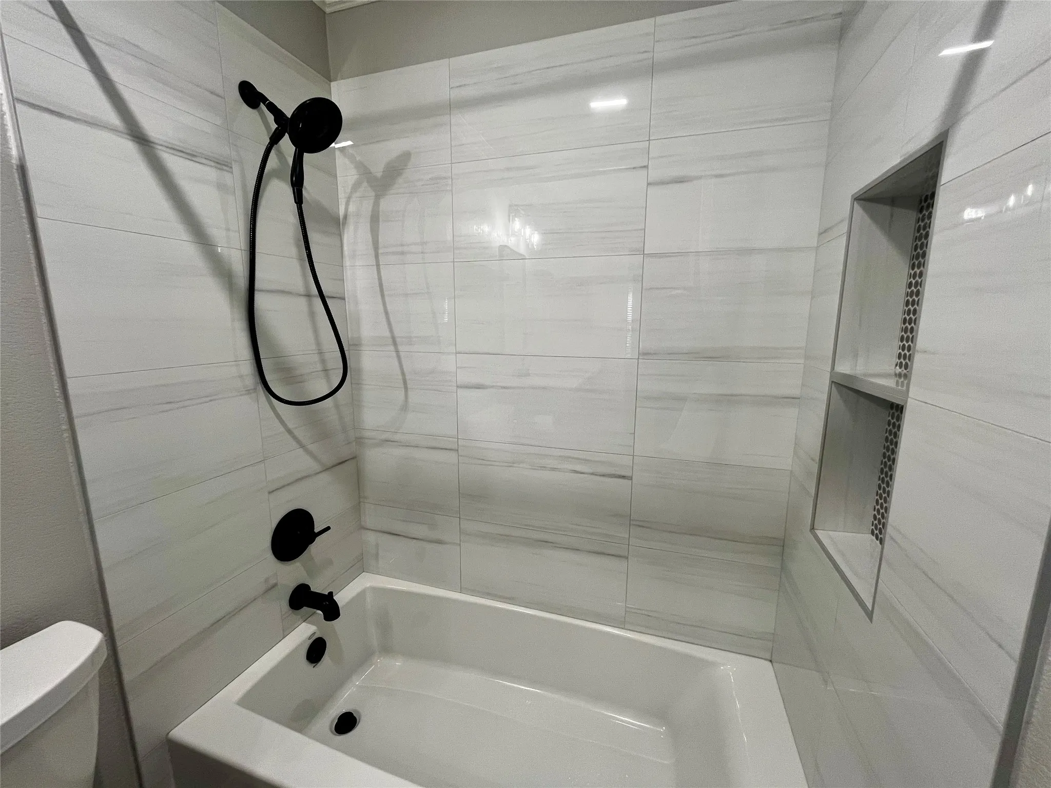Hall bath remodeled tub and tile, hardware