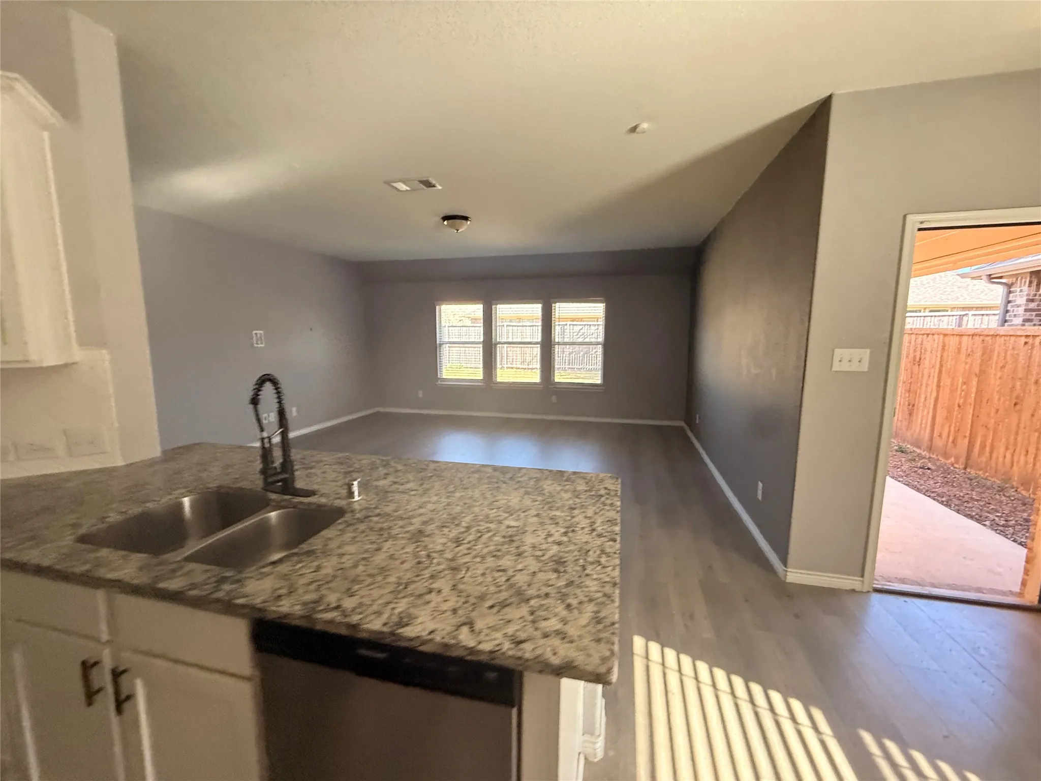 Kitchen island with dual basin sink and gooseneck faucet