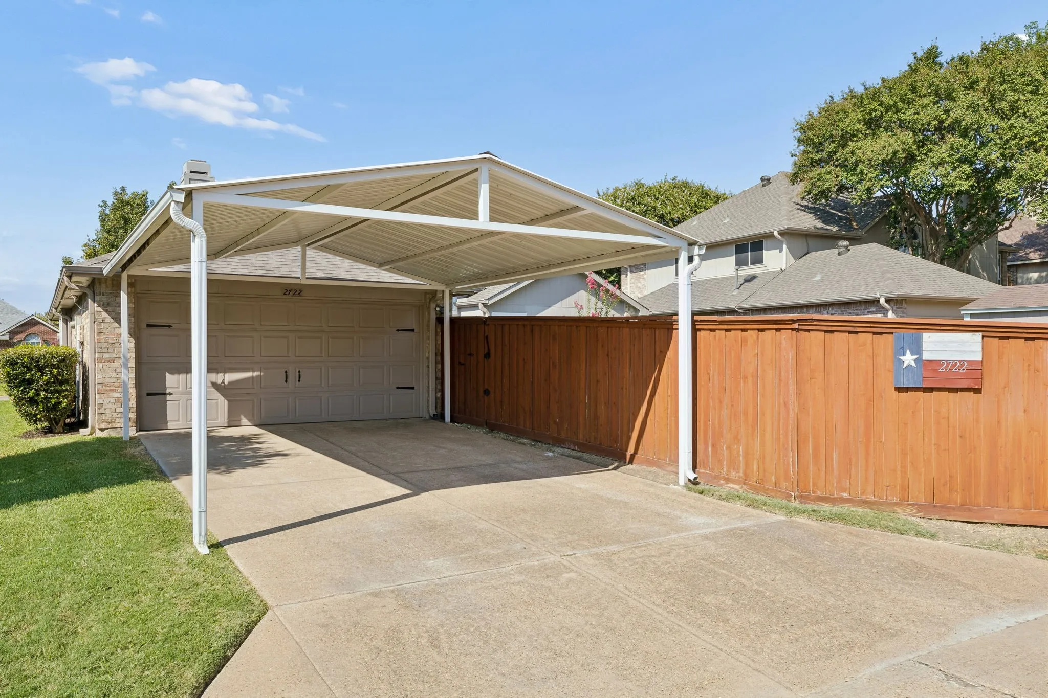 Great driveway with the protection of this "cut-above" carport!