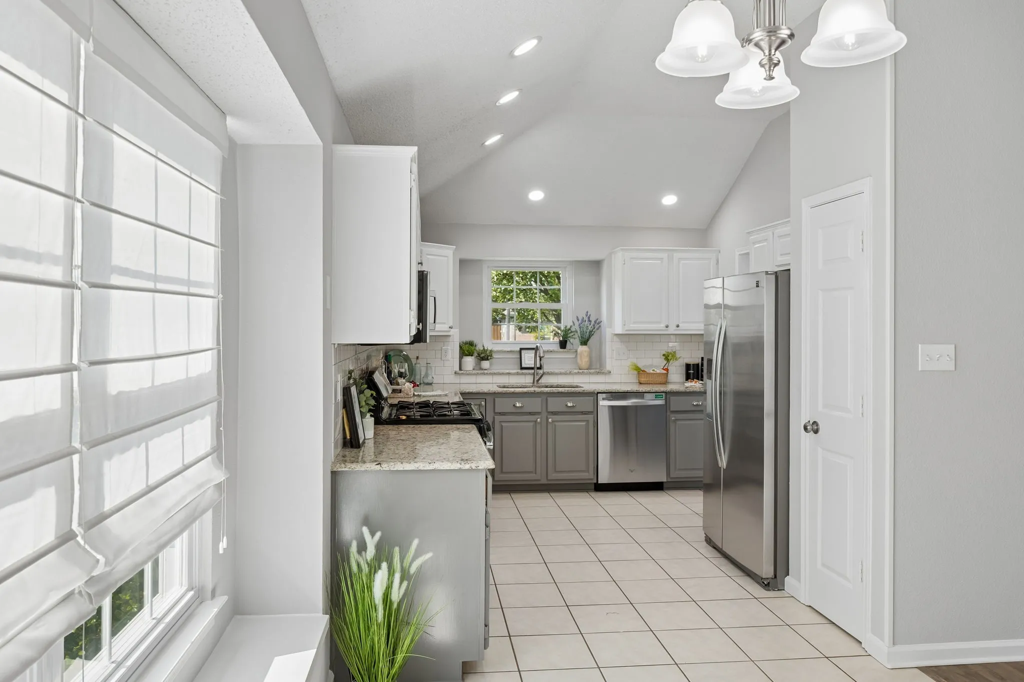 This view from the Breakfast area shows the warm and inviting flow of this updated home.