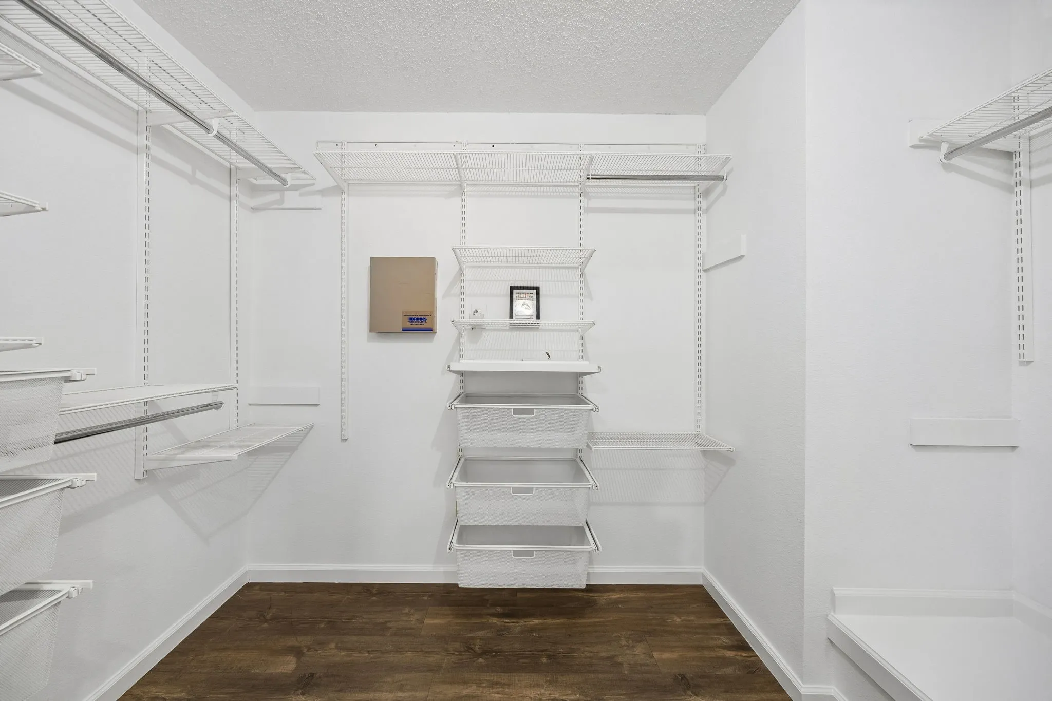 This professionally organized primary closet is perfect!