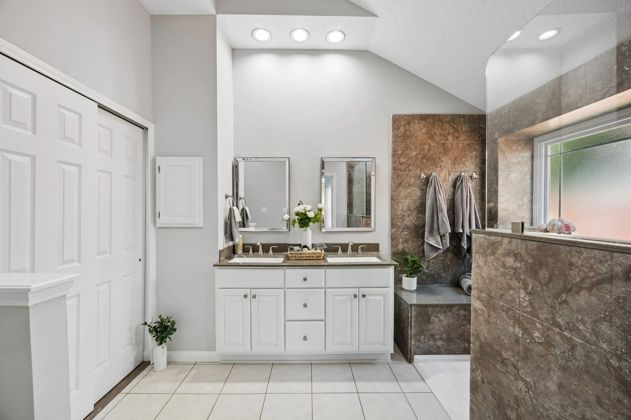 WOW! Is the word that comes to mind as you walk into this Stunning Updated Primary Ensuite!