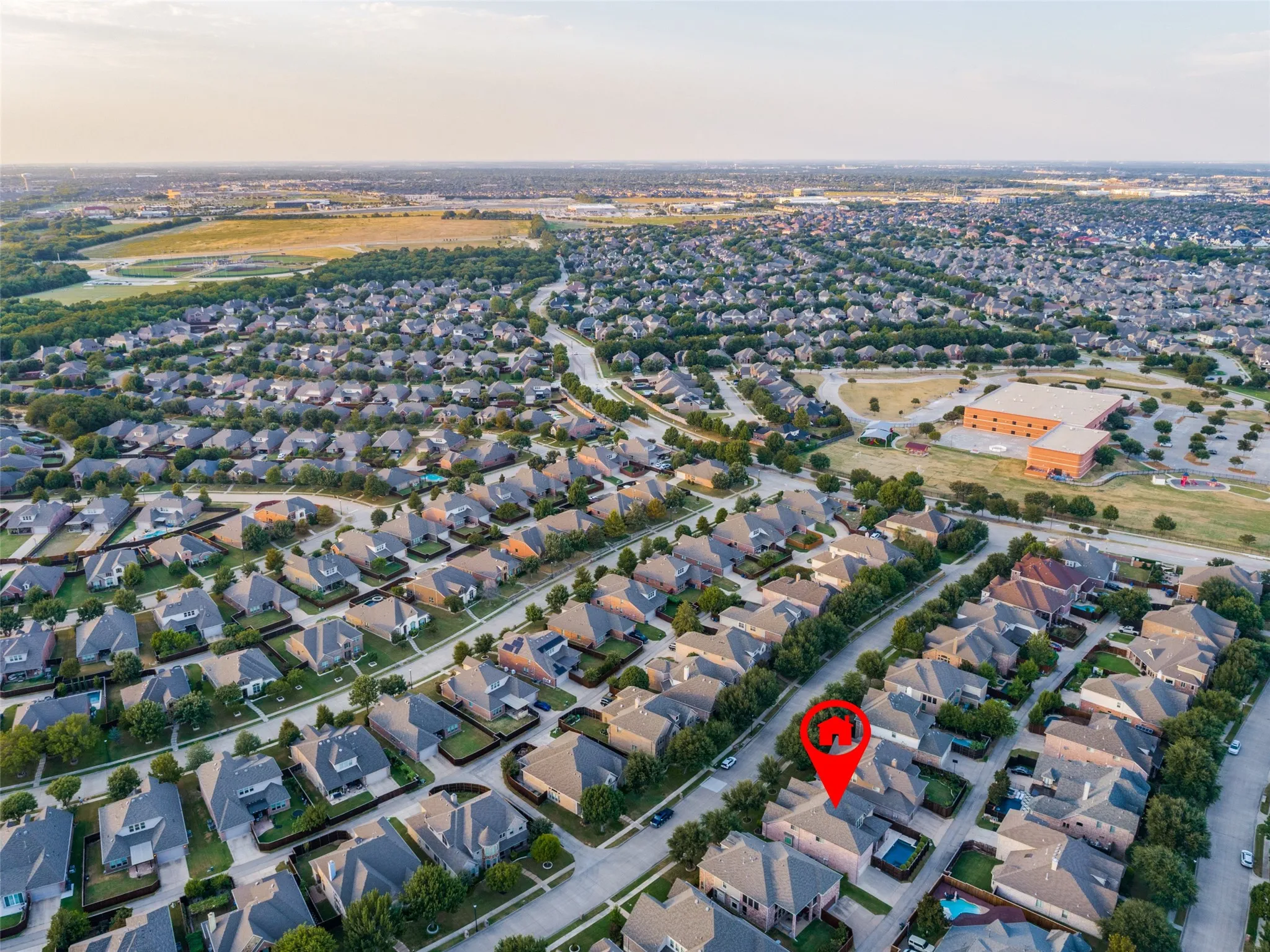 Suburban neighborhood setting with established residential streets and mature landscaping