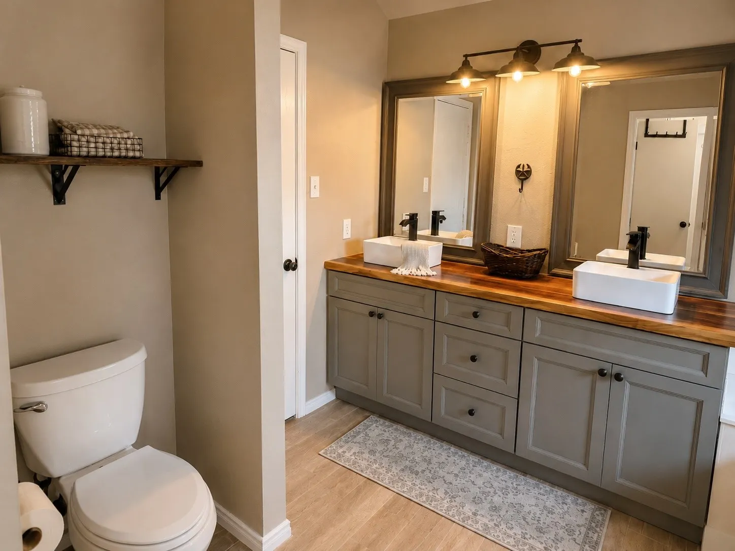 Dual vanity featuring a wood-finish countertop, rectangular vessel sinks, and matte black faucets