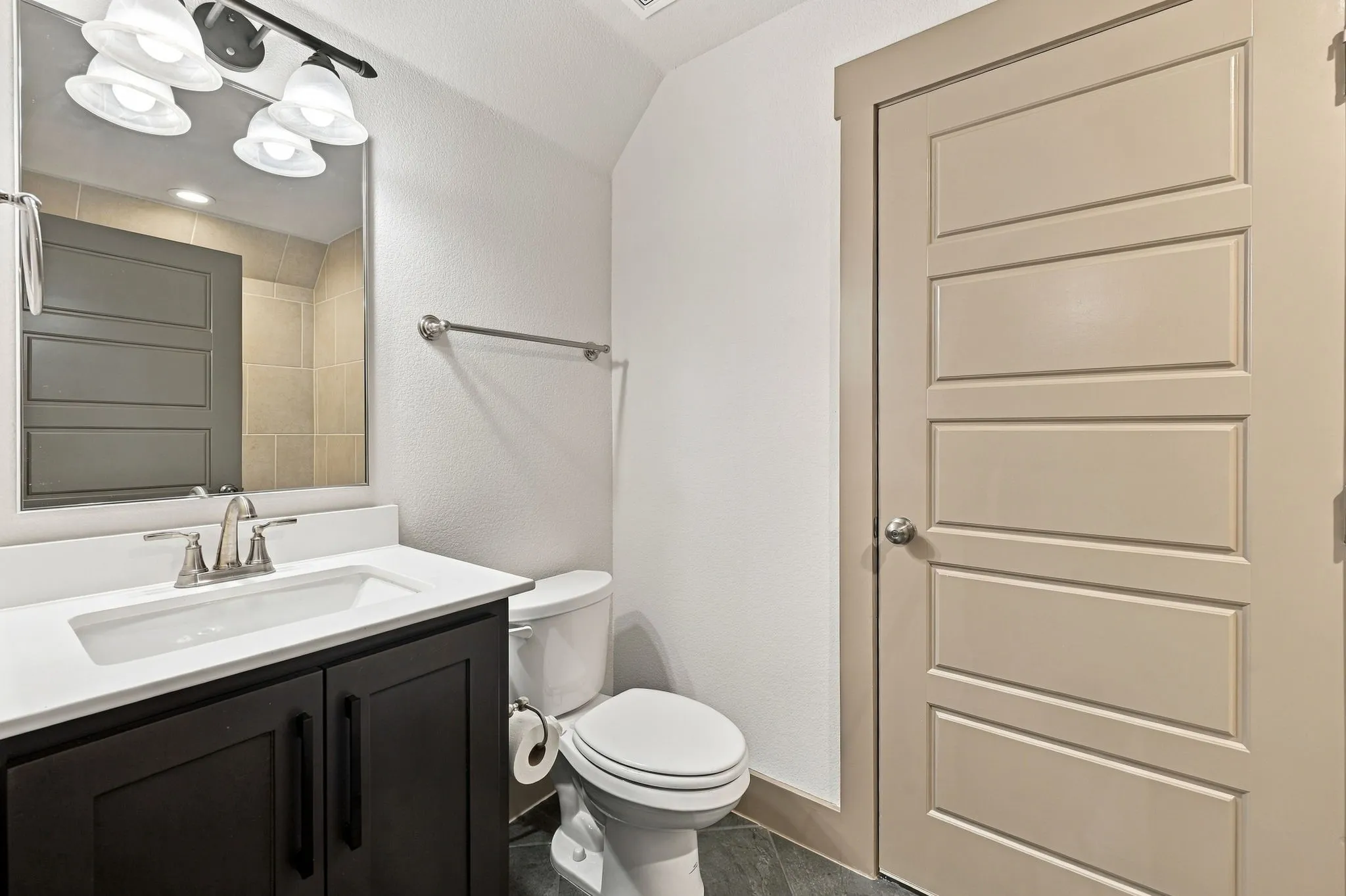 Vanity with integrated sink and chrome-finish faucet