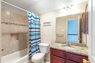 Full bathroom featuring vanity and shower / tub combo