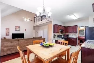 Overlooking family room and backyard