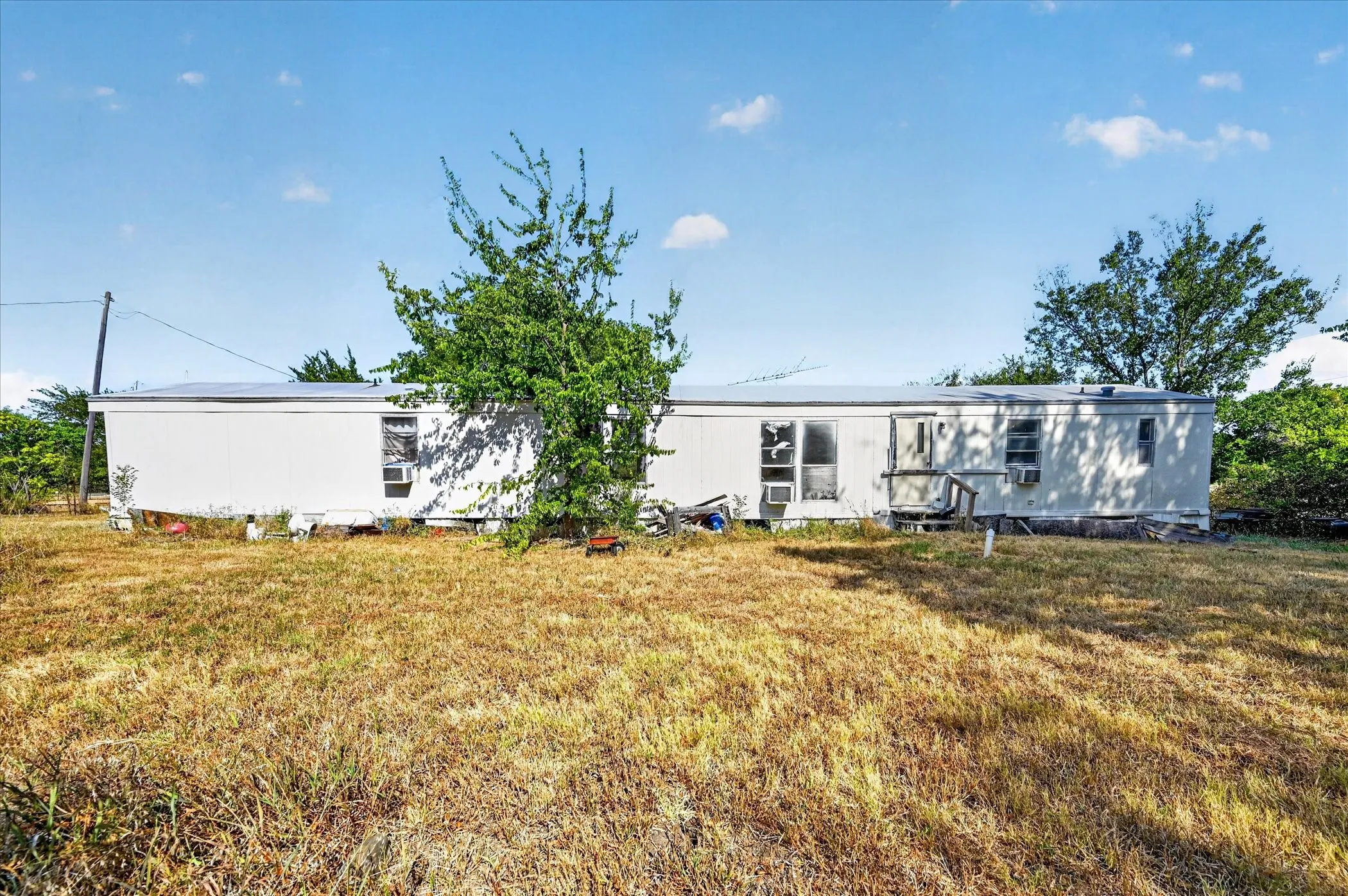 Mobile Home For Sale in Collin County , 7558 Sterling Drive, Anna, Texas 75409, 3 Bedroom, 2 Bathroom, Garage spaces, 1,190 Sqft, built in 1996, mls#21369847, Real Estate Agent in Anna, Homes For Sale in Collin county, Homes For Sale in Anna, Realtor in Anna Texas, Real Estate Brokerage Independent Realty Texas, Luminita Cordes Realtor