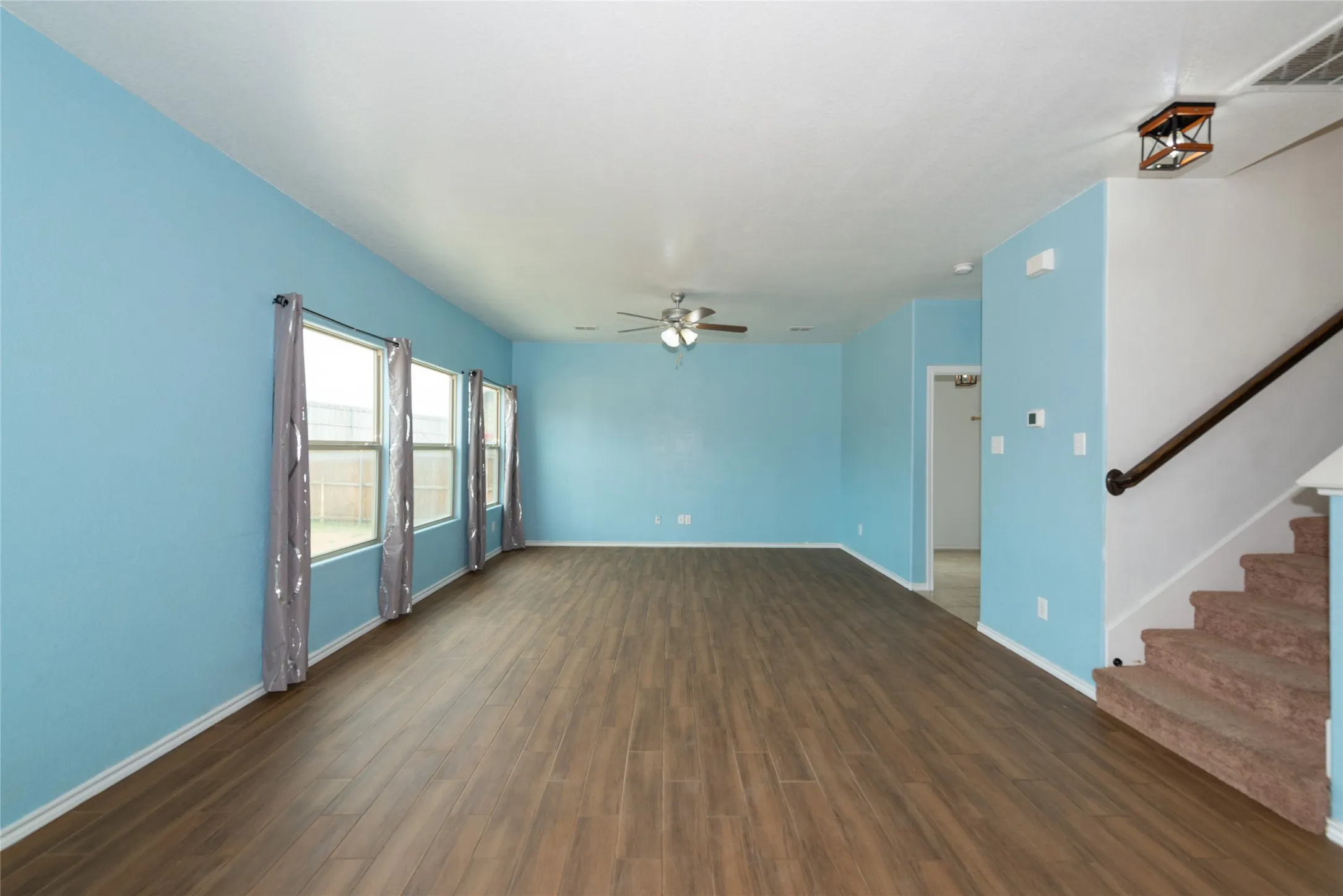 Wood-finish flooring throughout the main living space