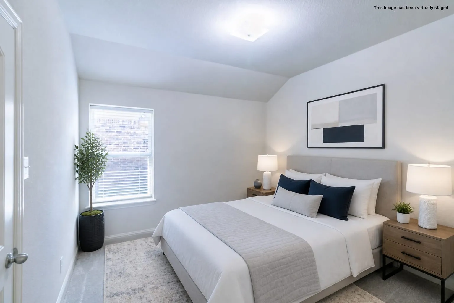 Virtual staged=>Vaulted ceiling with an integrated light fixture, window with blinds, and white painted walls