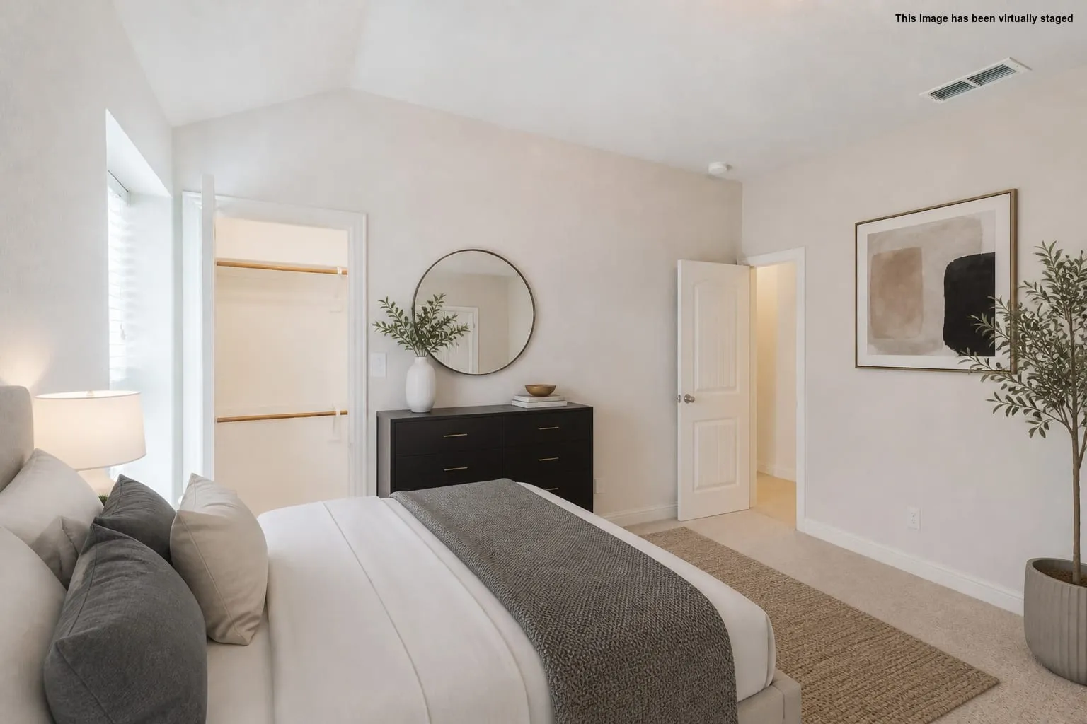 Virtual staged=>Vaulted ceiling with recessed lighting, integrated window blinds, built-in closet with shelving, and light-toned carpet flooring
