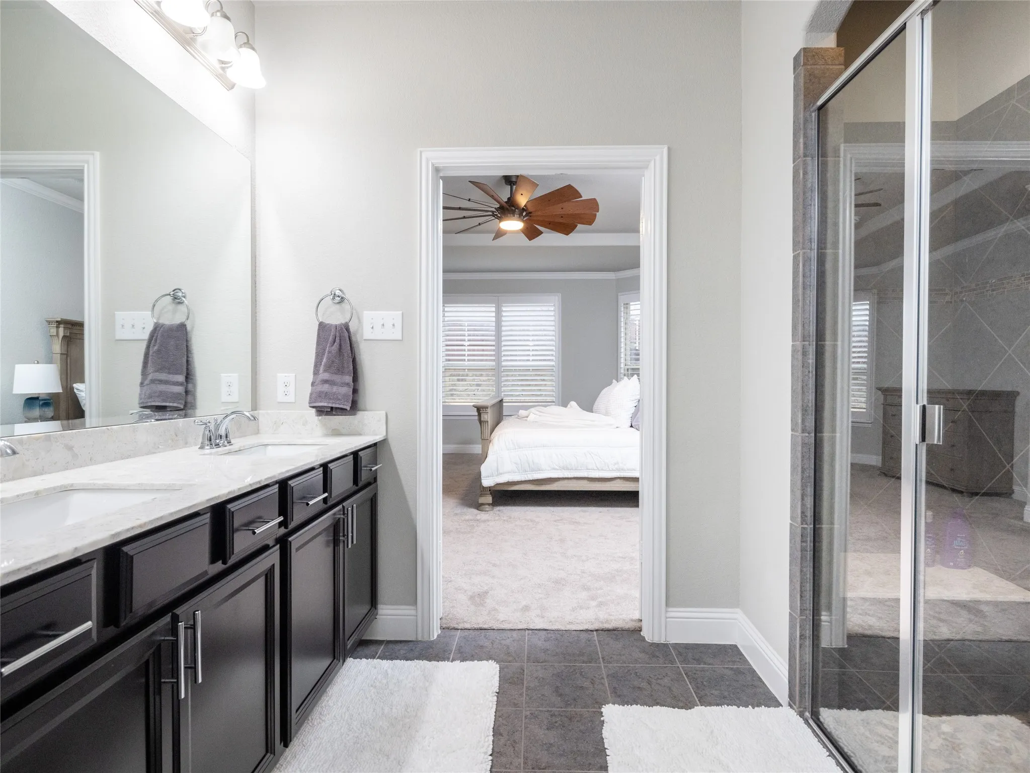 Double vanity with dual undermount sinks and chrome fixtures