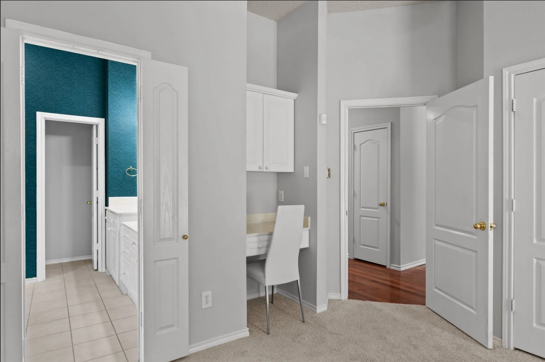 Built in vanity makes cosmetic storage and application area comfortable and convenient away from the bathroom dressing area.