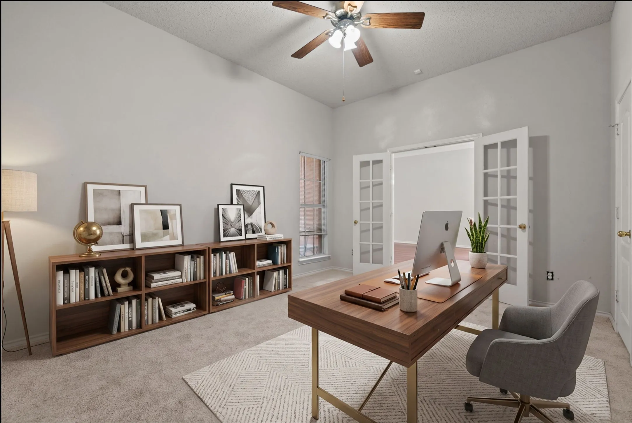 High ceiling with a ceiling fan, new carpeted flooring, and French doors. LARGE walkin closet that spans the length of the room is convenient for storing office supplies and equipment out of sight. Convenient to front door entrance for home office clients.