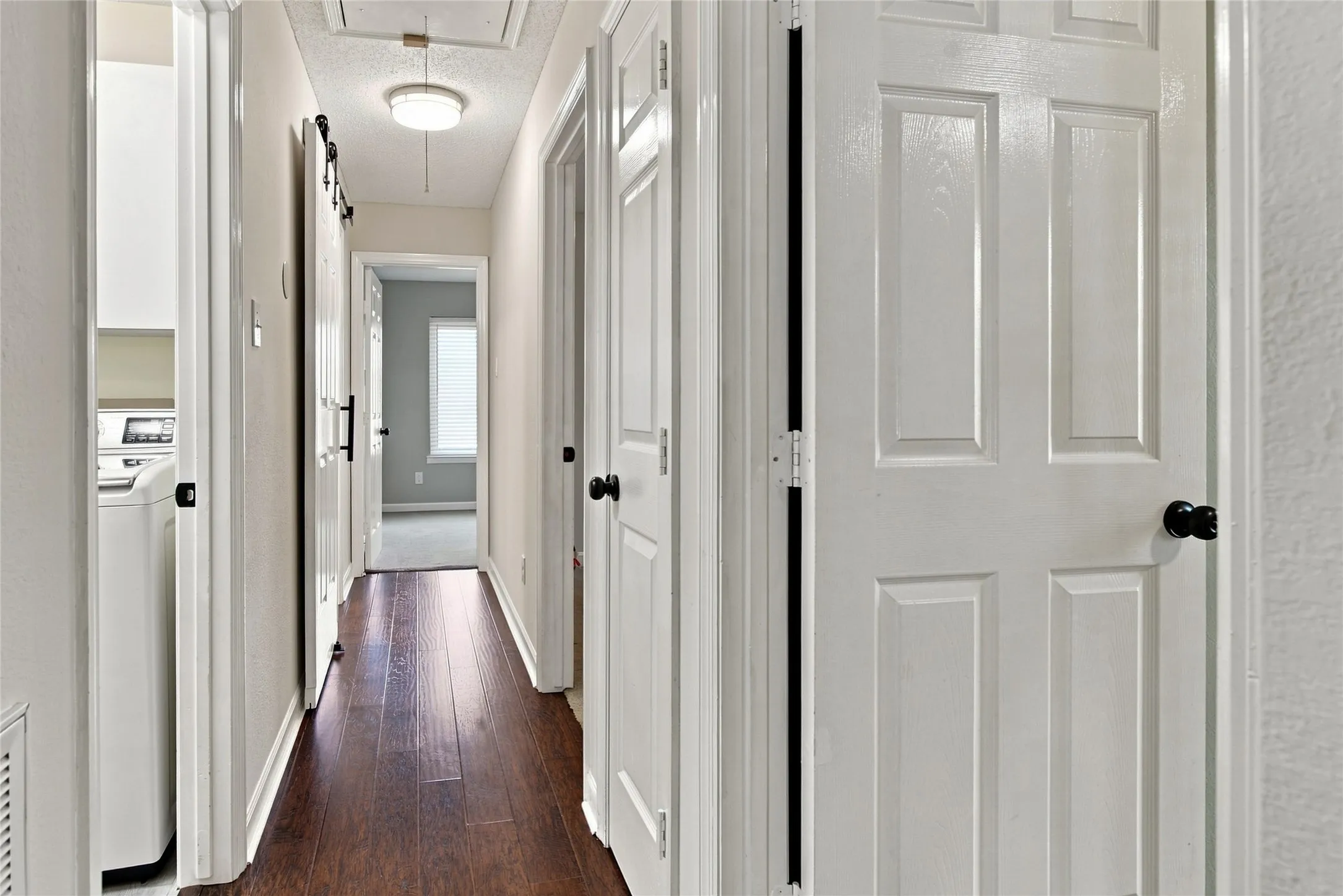 Hallway to secondary bedrooms