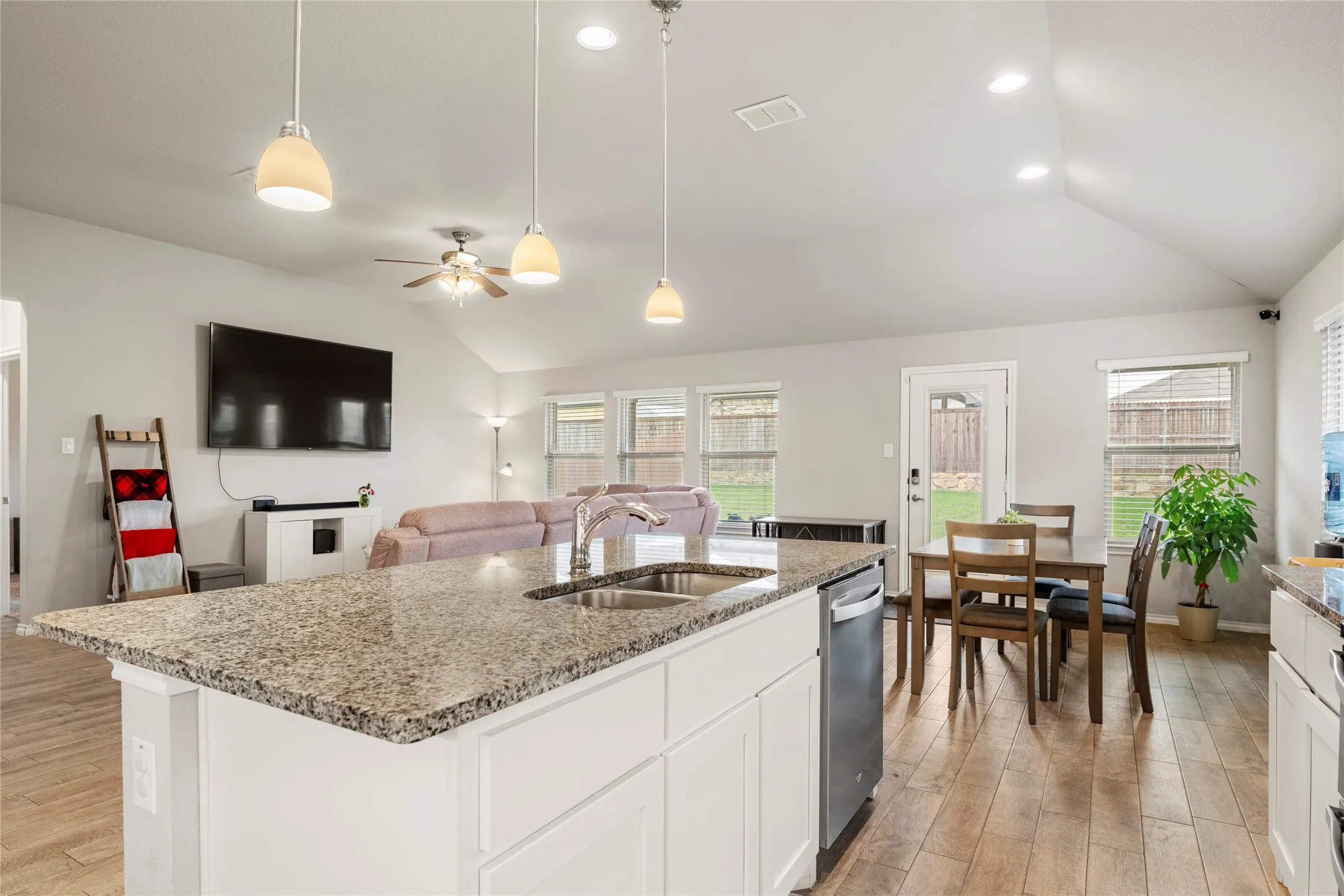 Great center island with granite countertop, that looks onto the dining and living areas.....