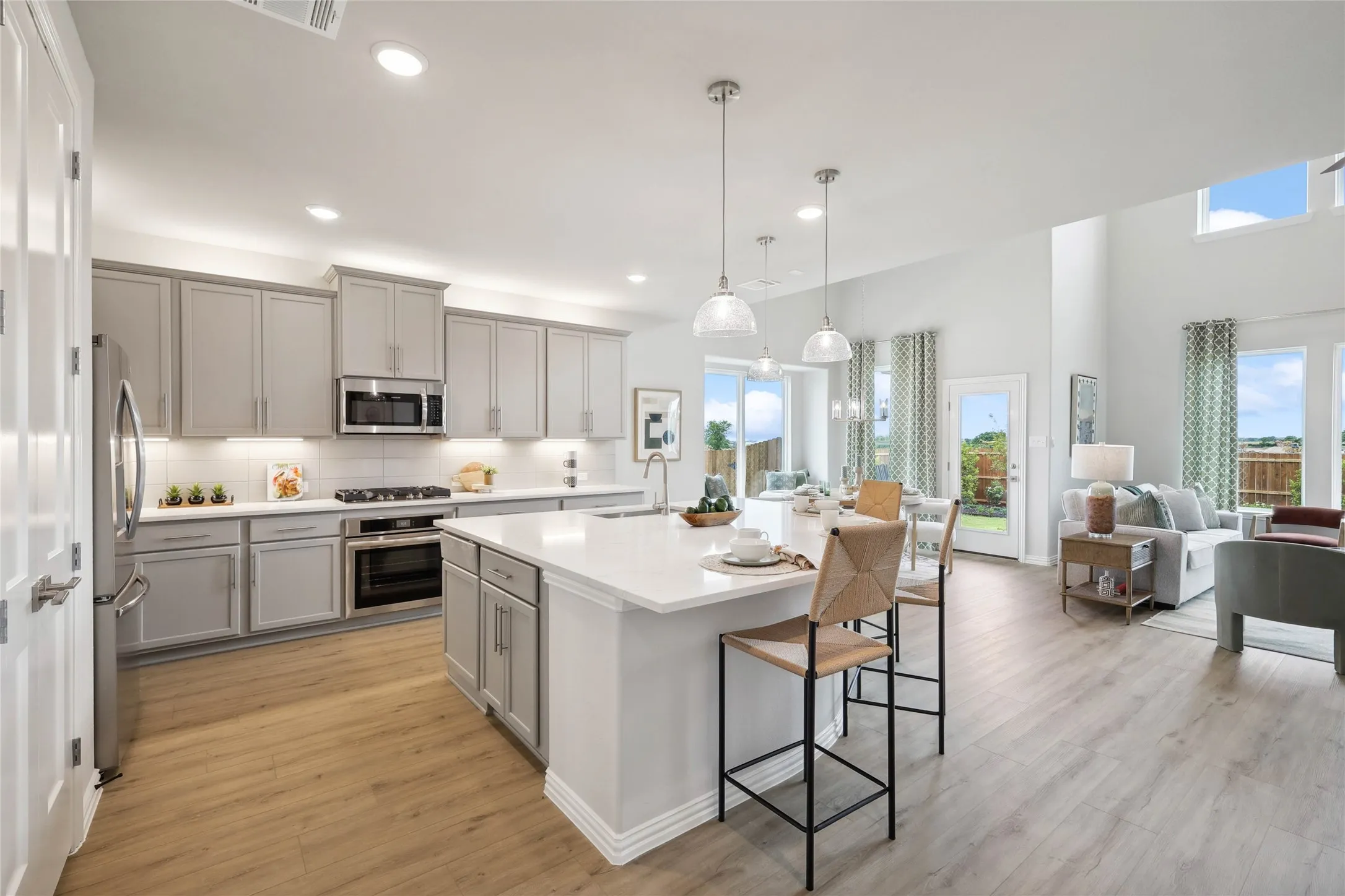 Model home photos of similar floorplans, not pictures of actual home.

