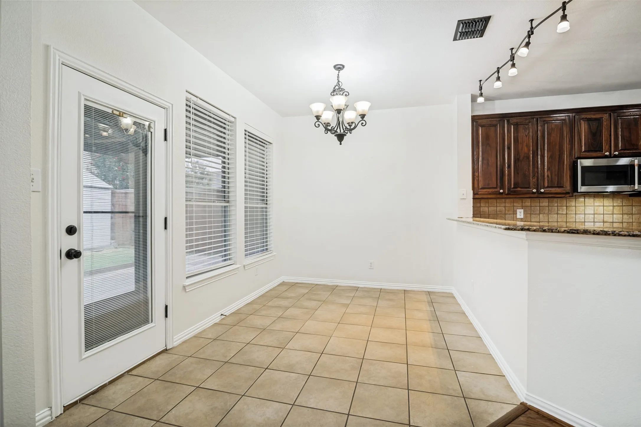 Breakfast nook is just off of the kitchen and living areas for the perfect flow.