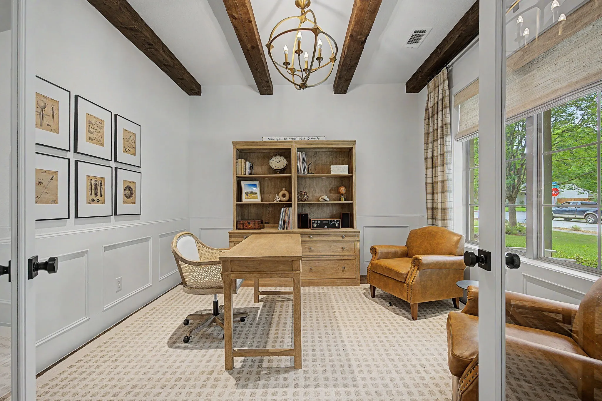Office with exposed wood beams