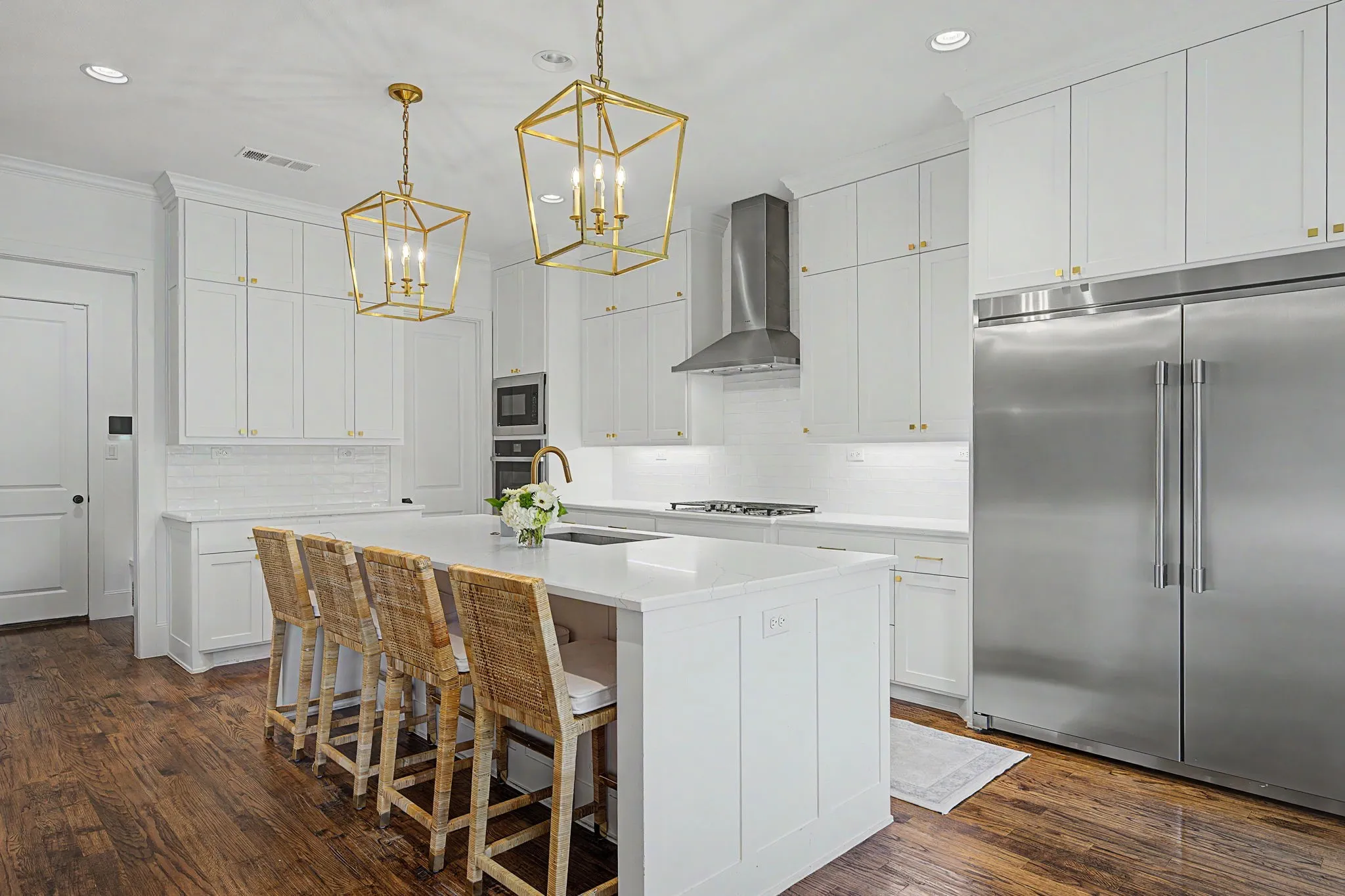 Kitchen with oversized refrigerator
