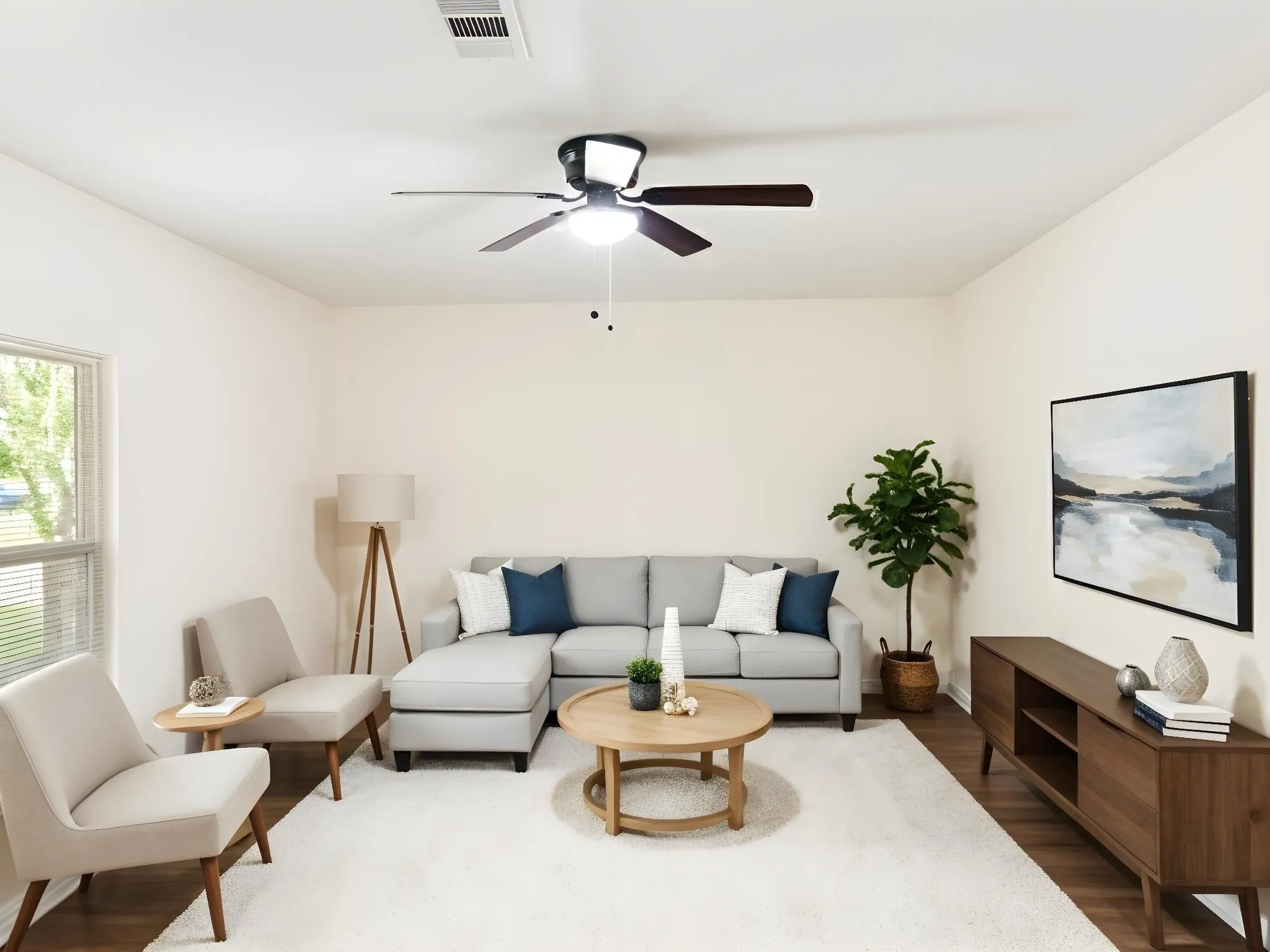 Recessed lighting, wood-finish flooring, and a ceiling fan with integrated lighting
