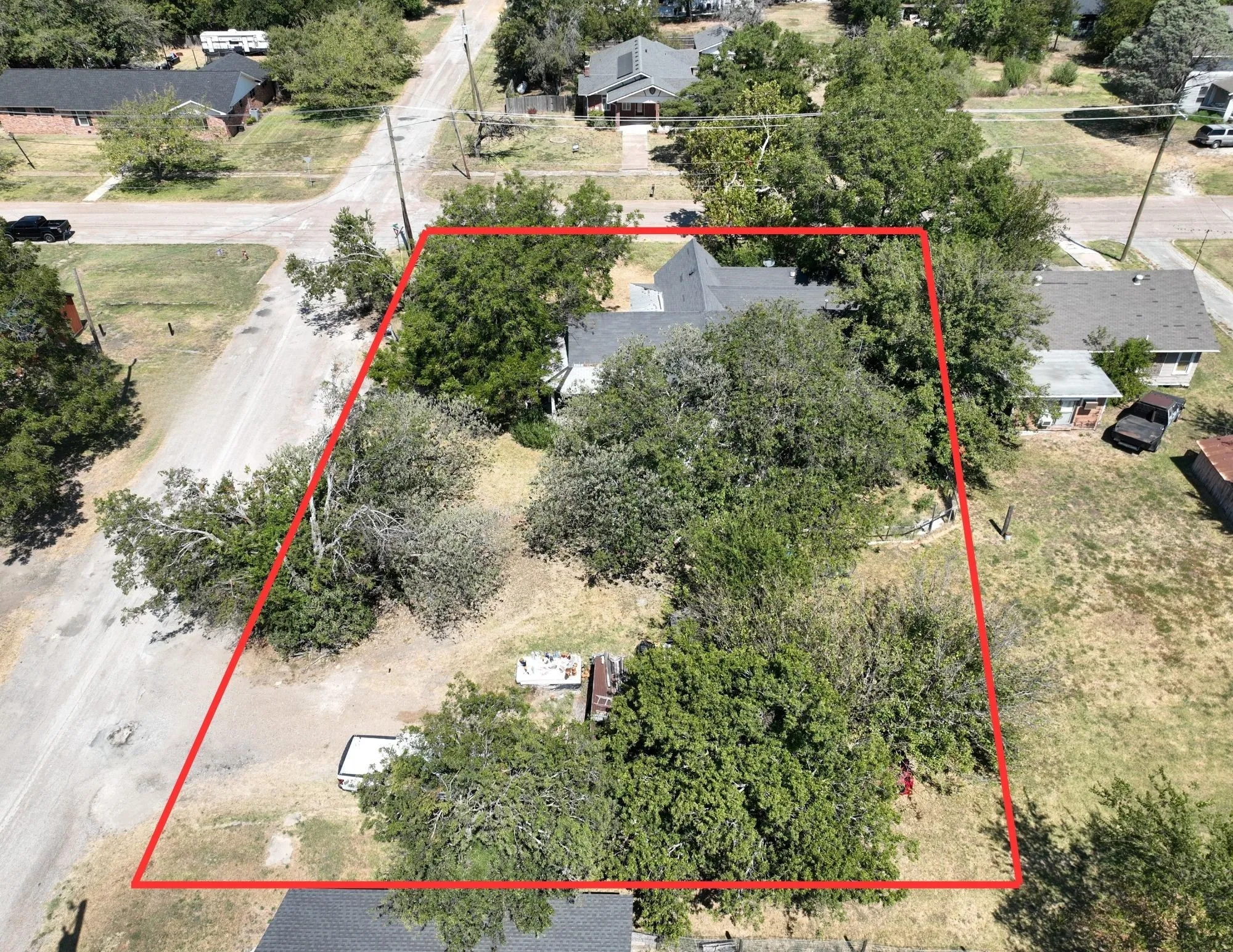 Expansive property featuring mature trees and a residential setting