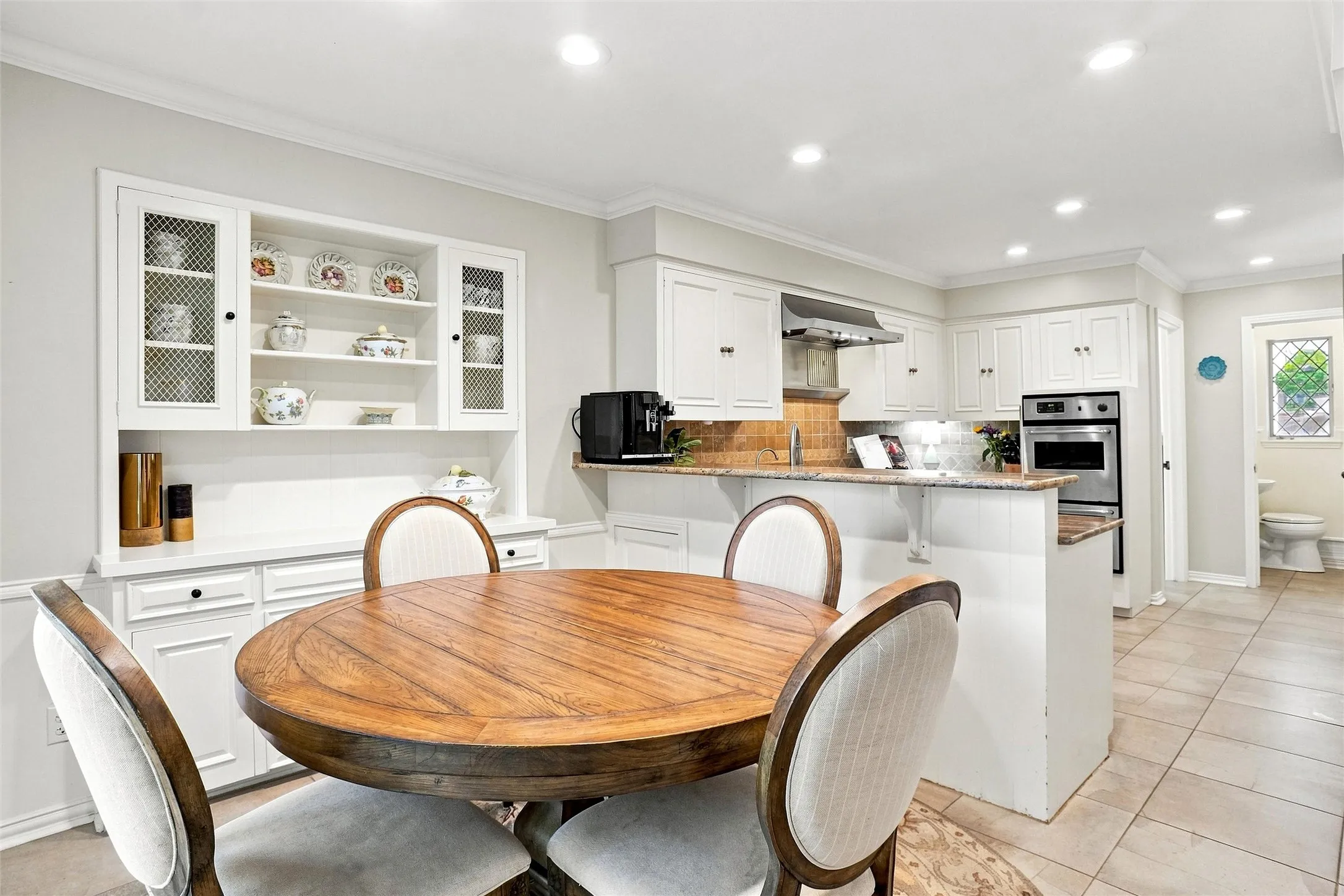 The natural light and added recessed LED's make for such a cheery kitchen and breakfast area.