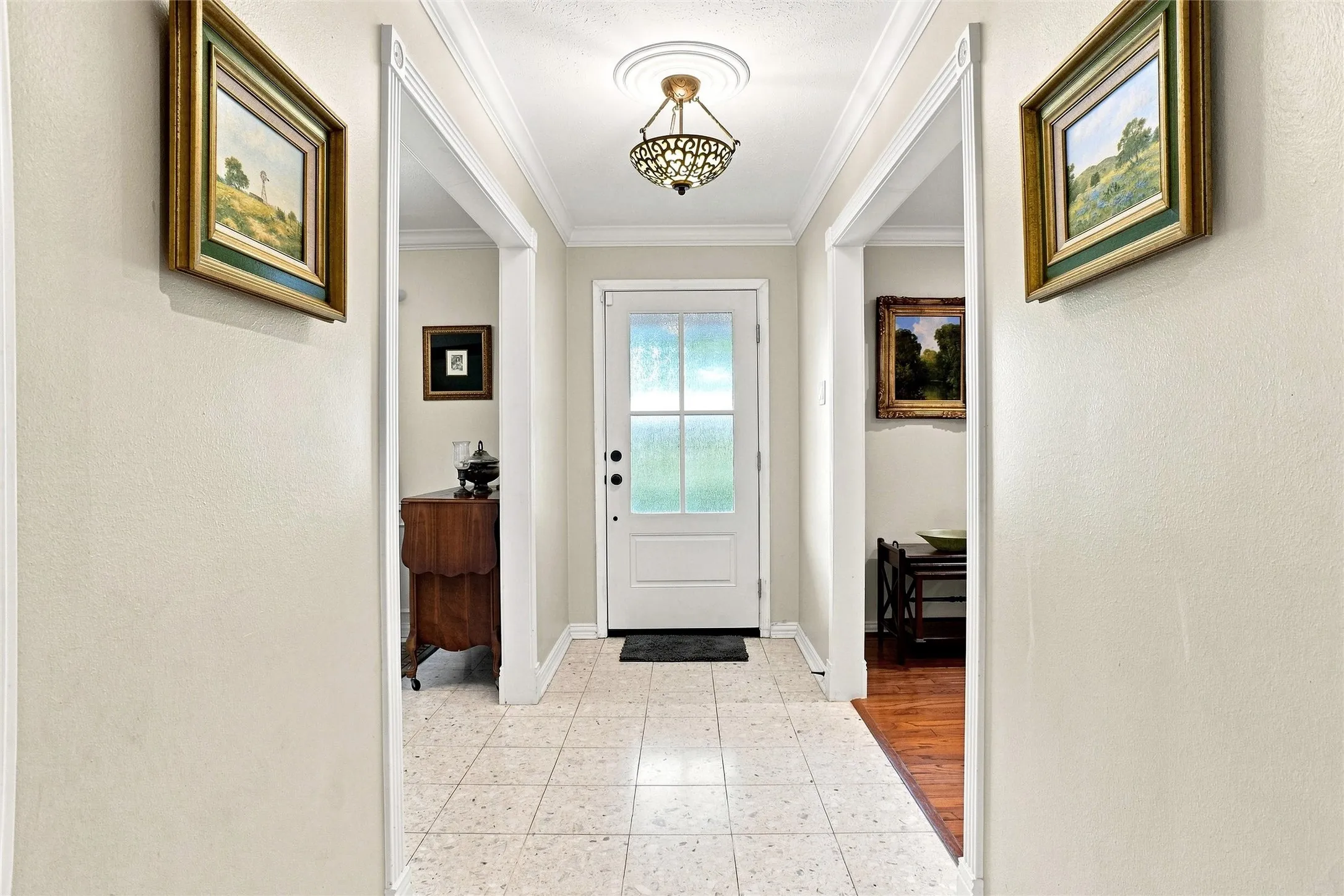 Looking towards the new entry door and the original Terrazzo floor in the entry and dining room to the left. A beautiful floor so popular in the Mid-Century homes.