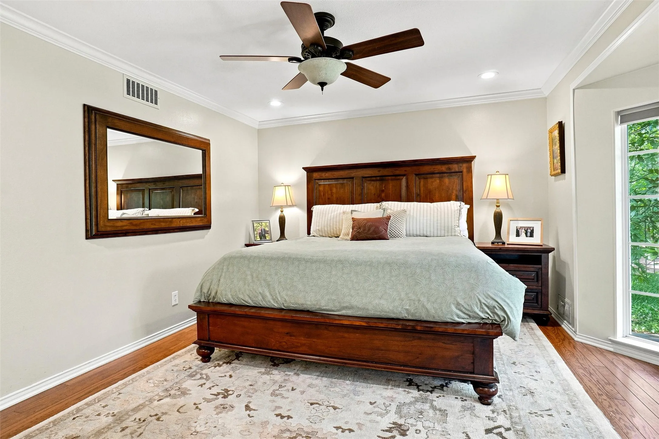 Another view of the primary bedroom.