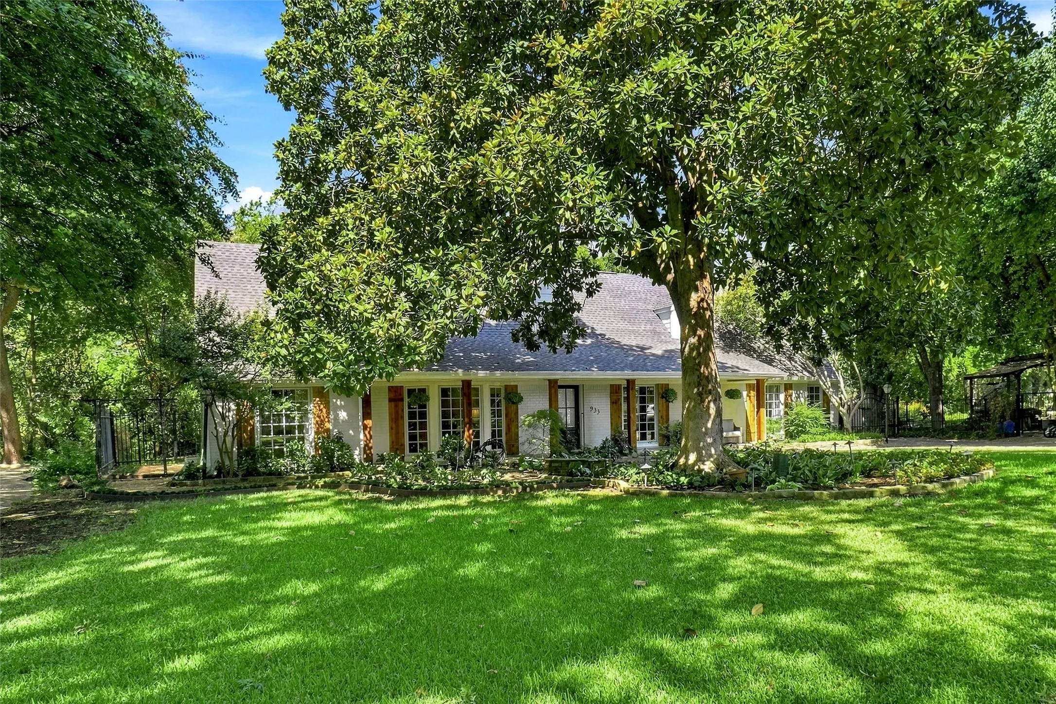 There is also and underground electric fence around the front yard to keep your pets safe. Homes with this combination of architectural character, mature landscaping, creek-side privacy, and thoughtful updates are exceptionally hard to find. This is more than a home—it is a very special place to live.