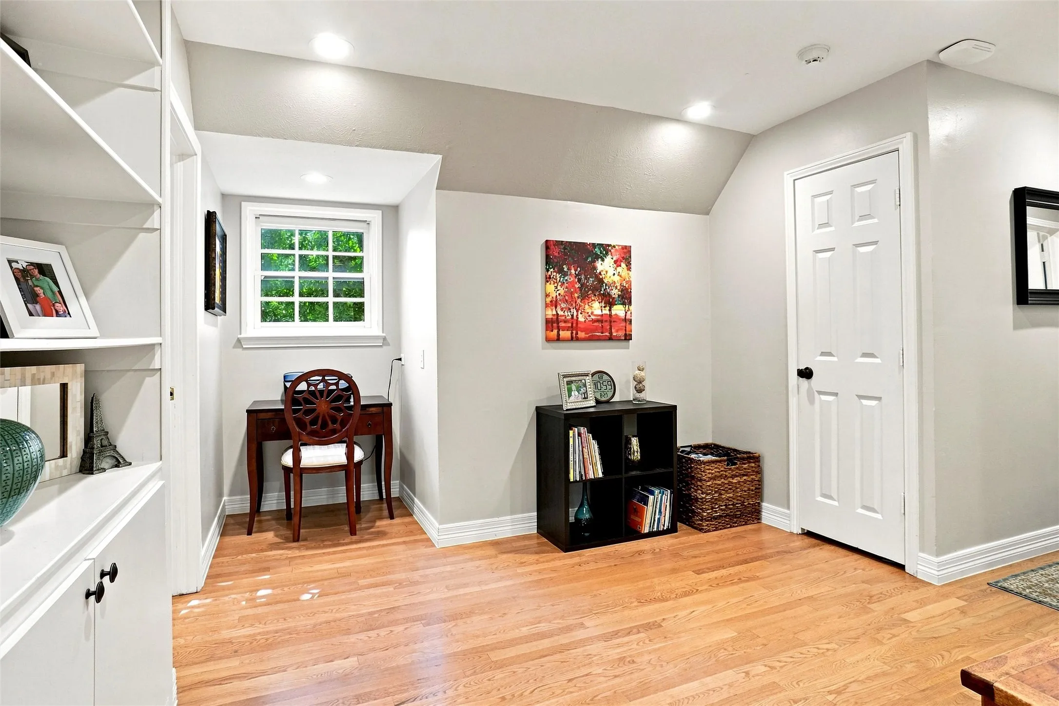 Another view of the game room with extra closet and a good view of the writing niche.