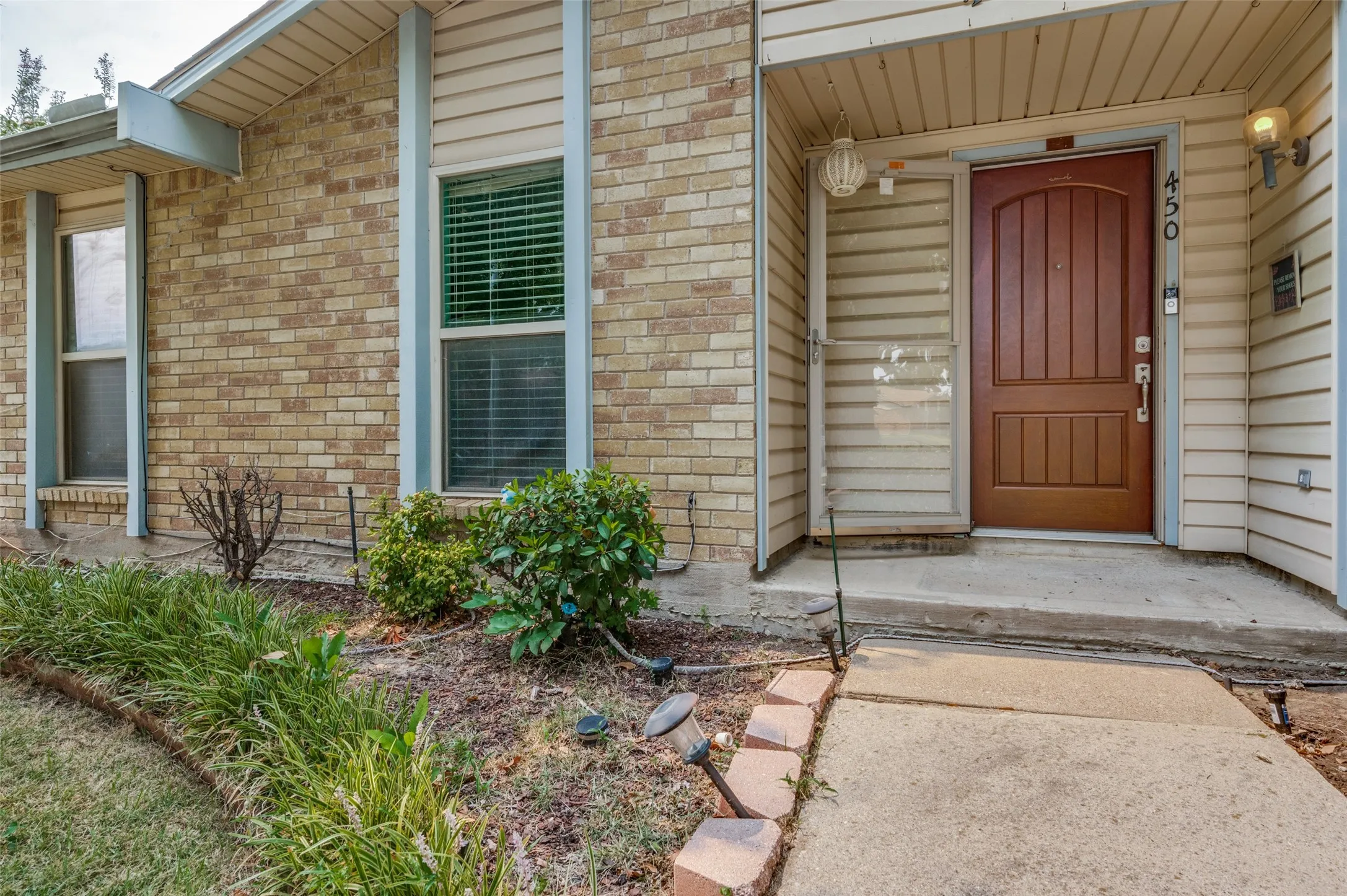 Brick and siding exterior with decorative trim