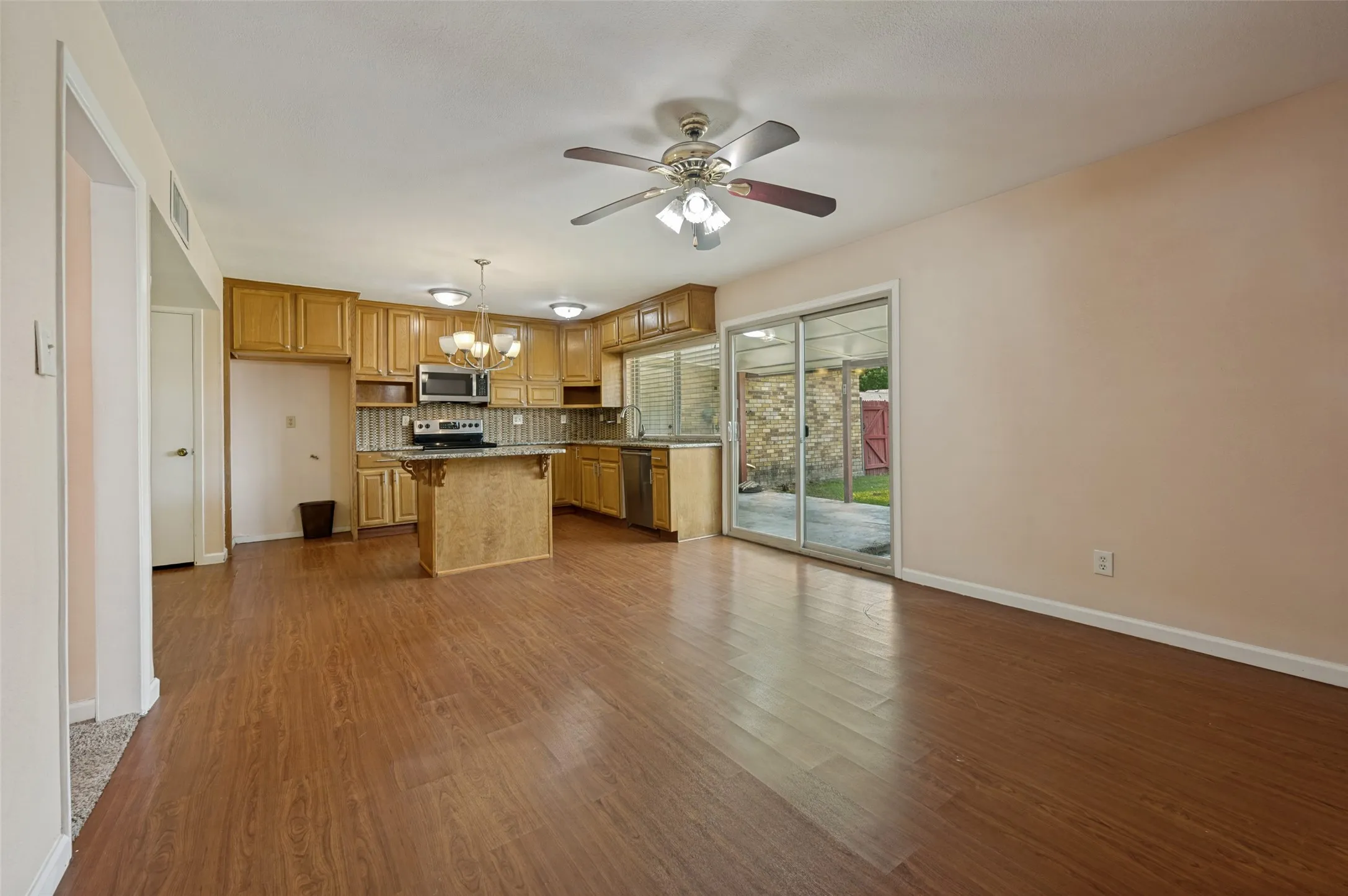 Wood-finish flooring throughout the main living space