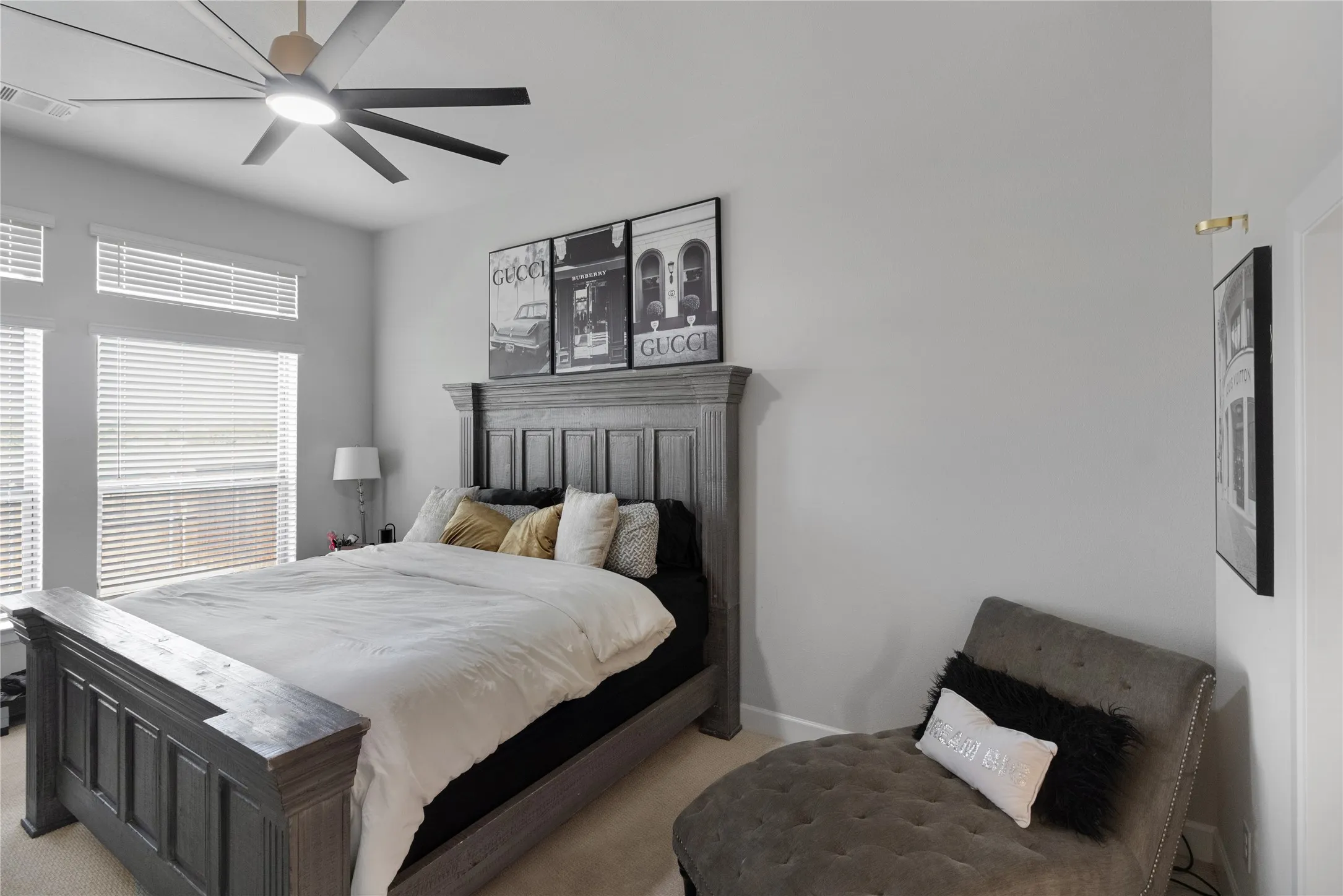 Recessed lighting, ceiling fan with light, multiple windows with blinds, light-toned walls, and carpeted flooring